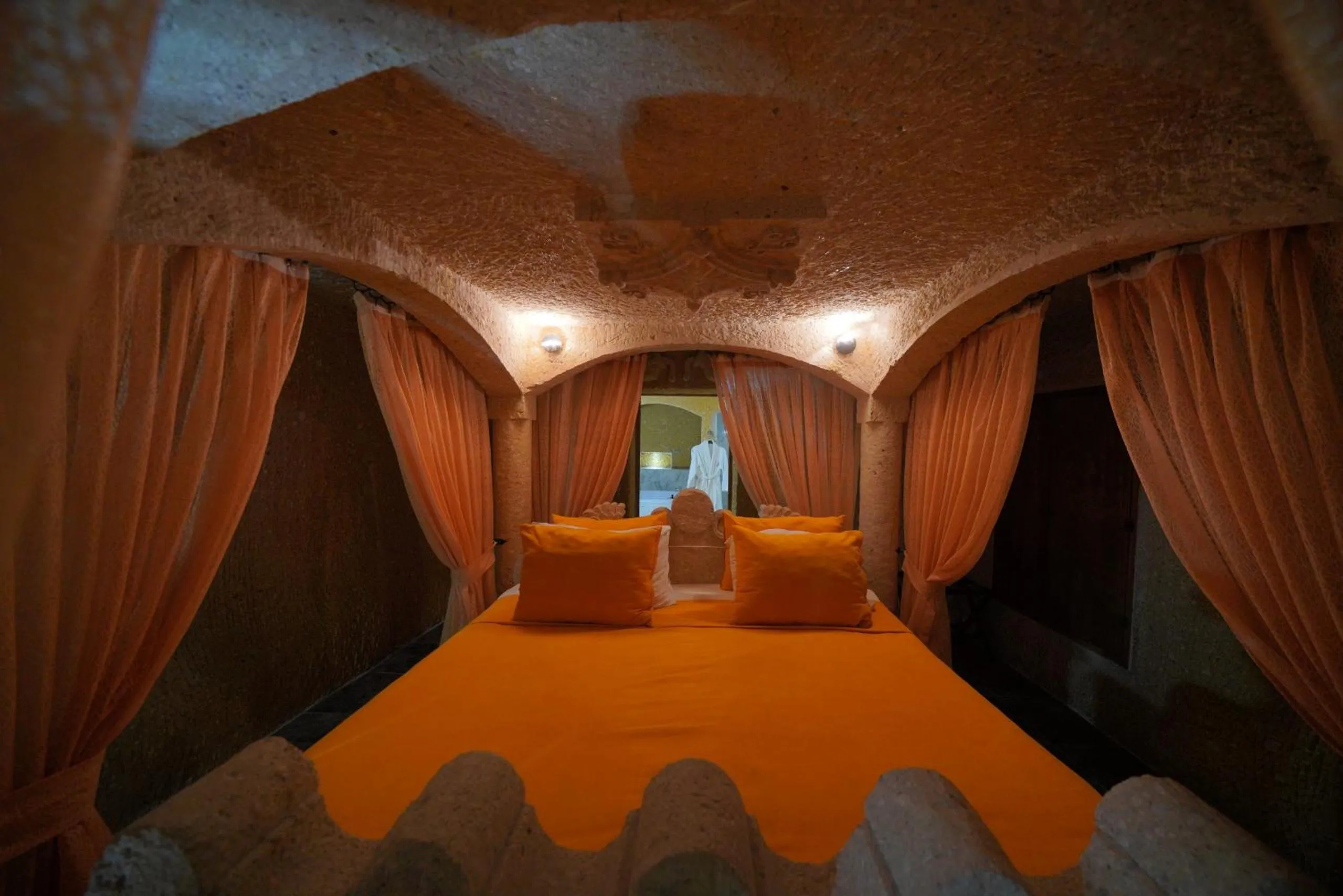 Bed in Holiday Cave Hotel
