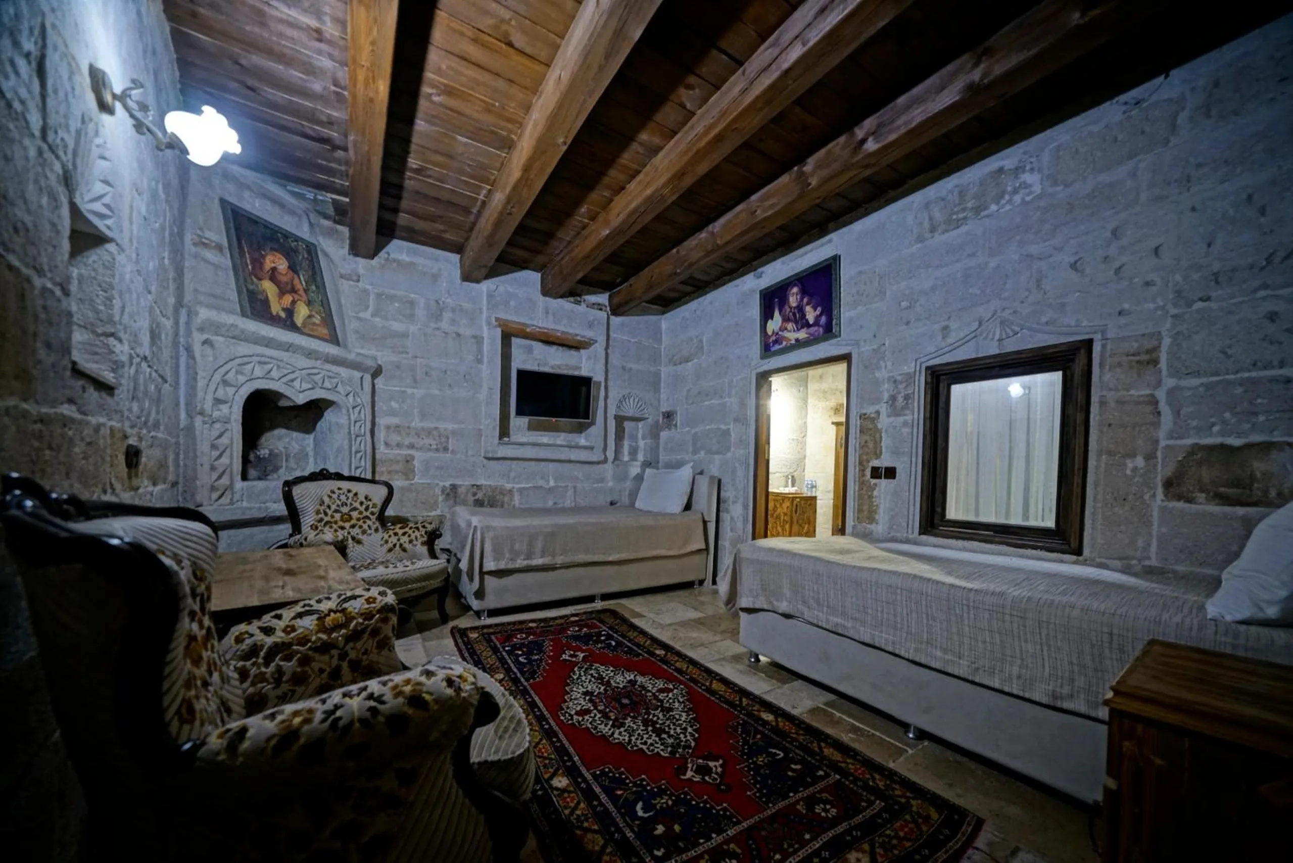 Bed in Holiday Cave Hotel