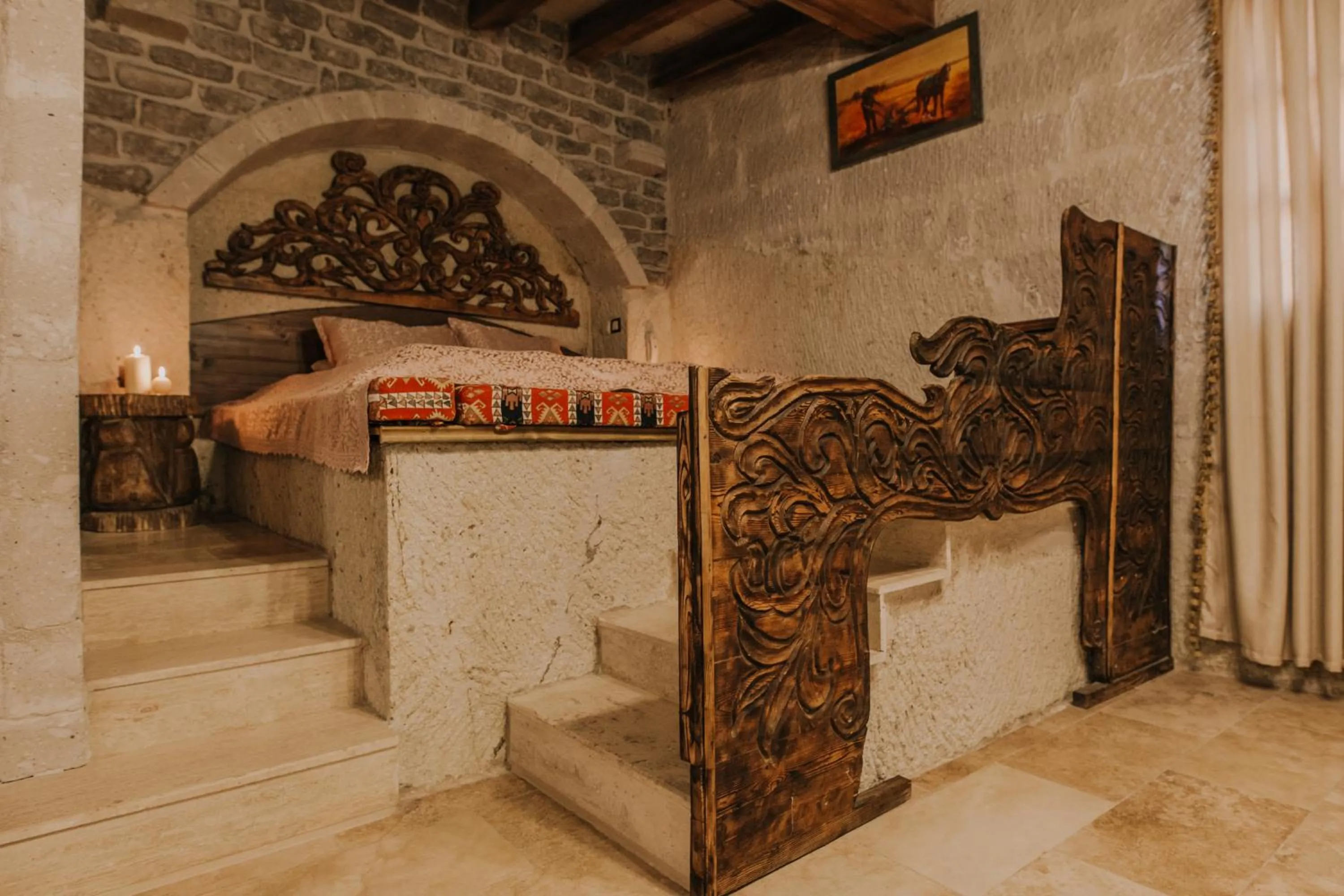 Bed in Holiday Cave Hotel