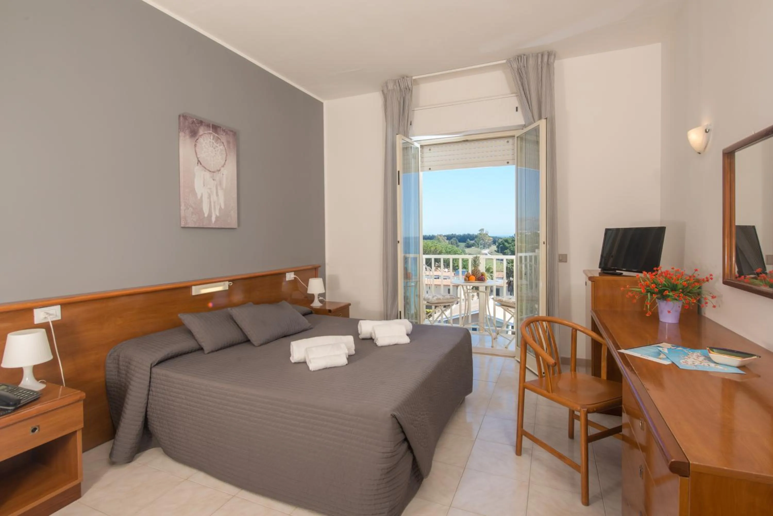 Bed in Hotel President Sea Palace