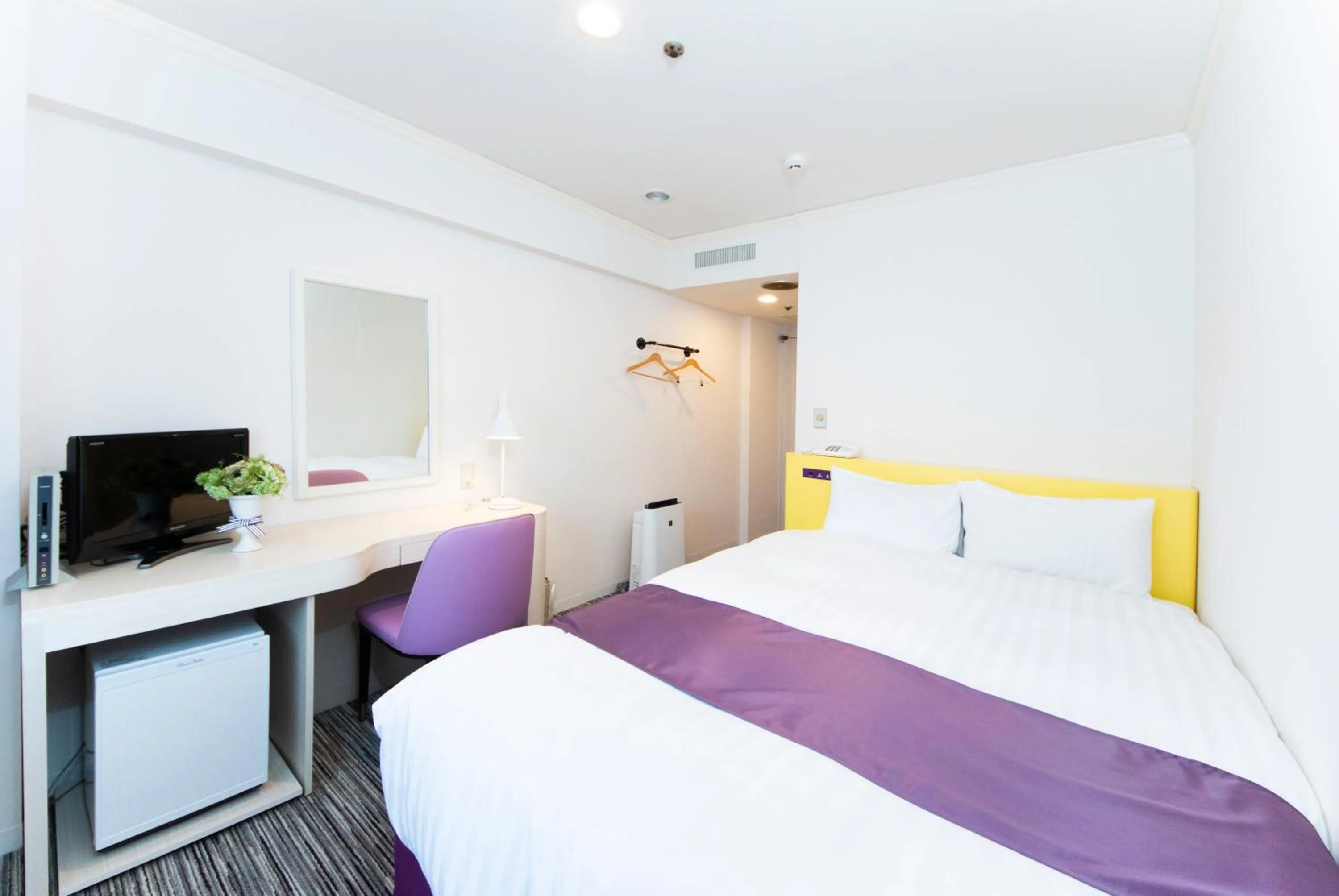 Bed in Hotel Montoview Yonezawa