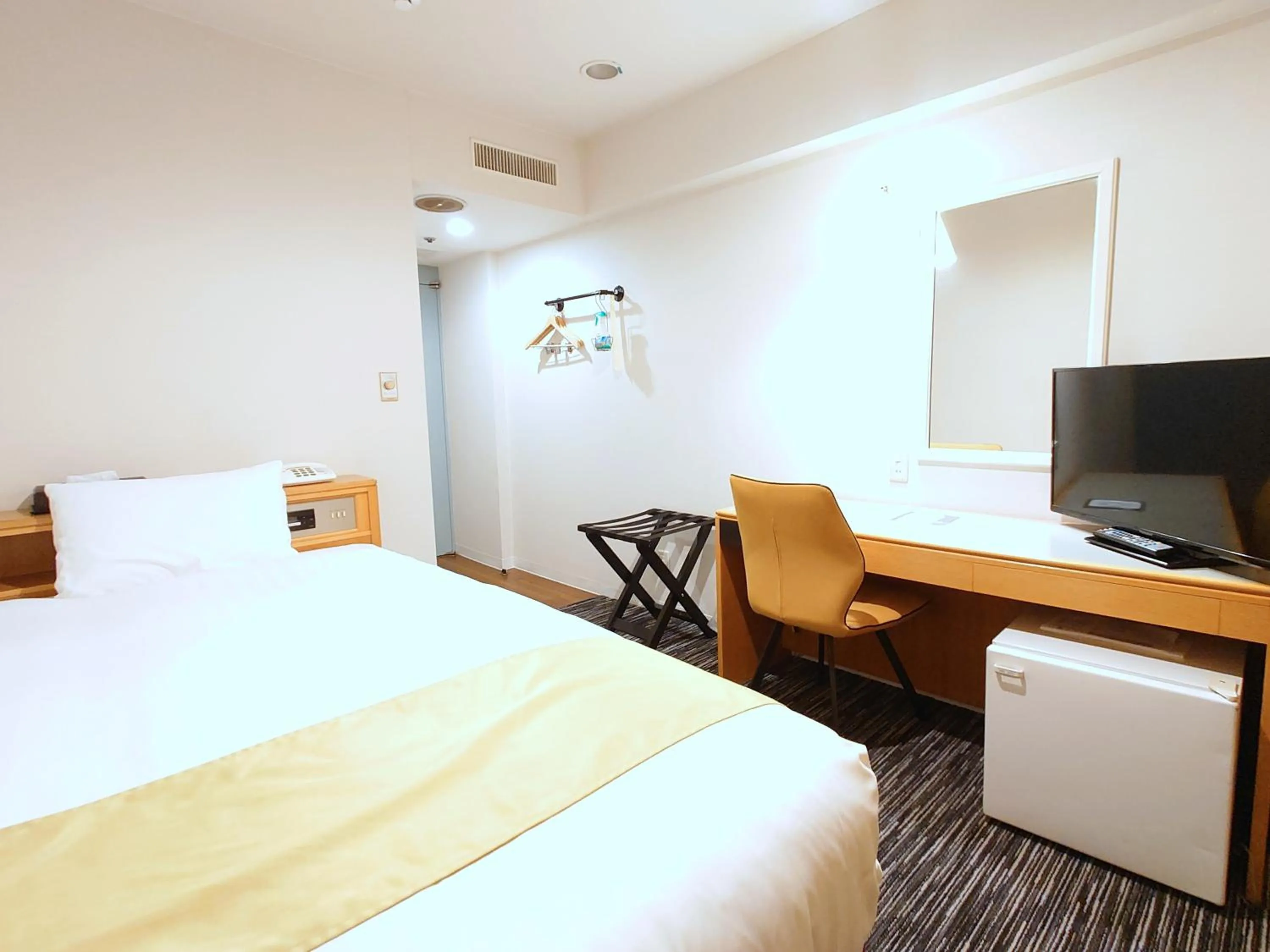 Bed in Hotel Montoview Yonezawa