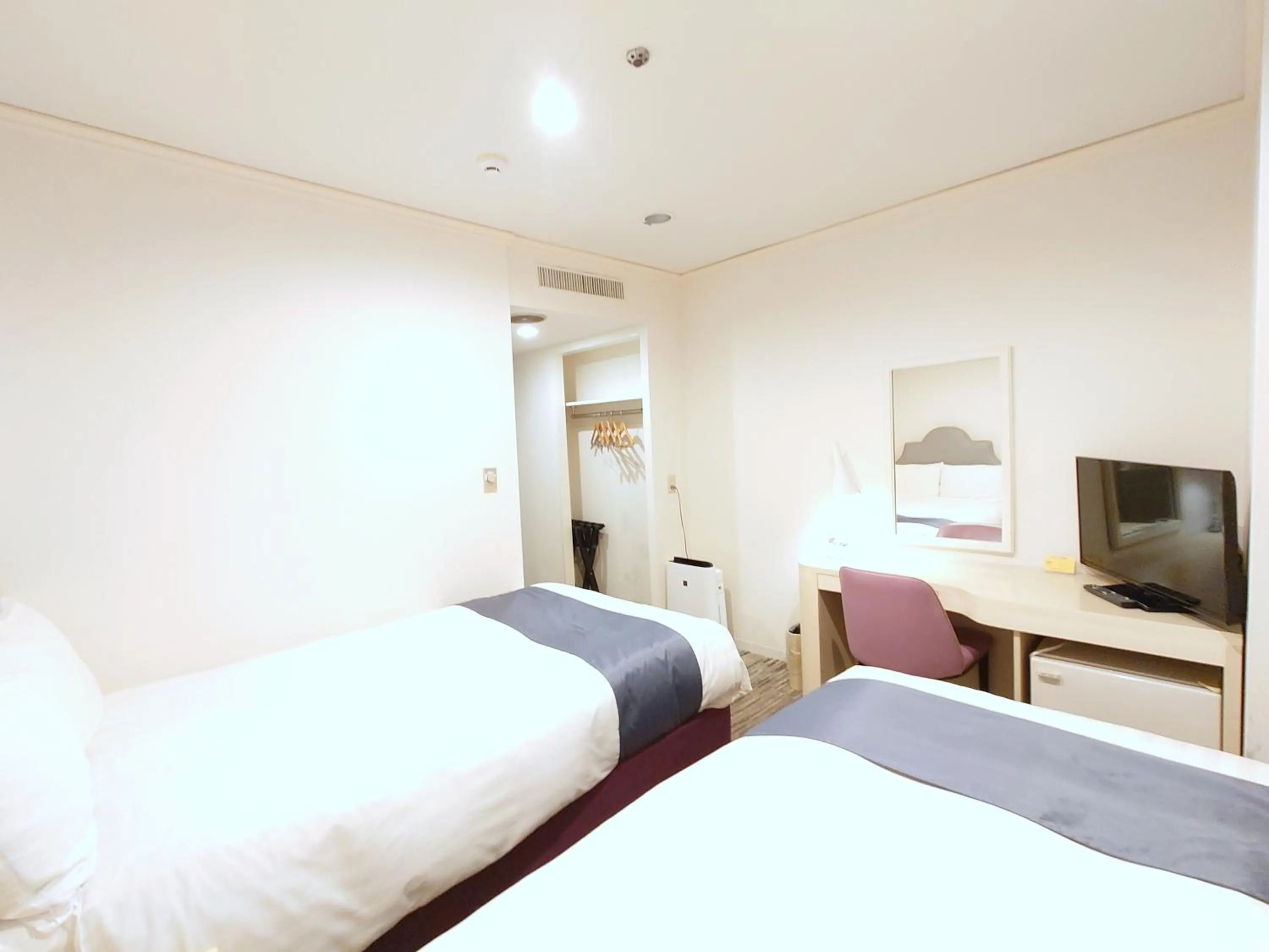 Bed in Hotel Montoview Yonezawa