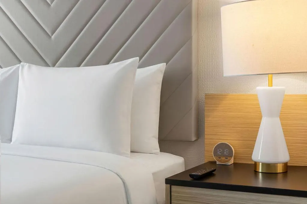 Bed in The Garden Hotel & Resort