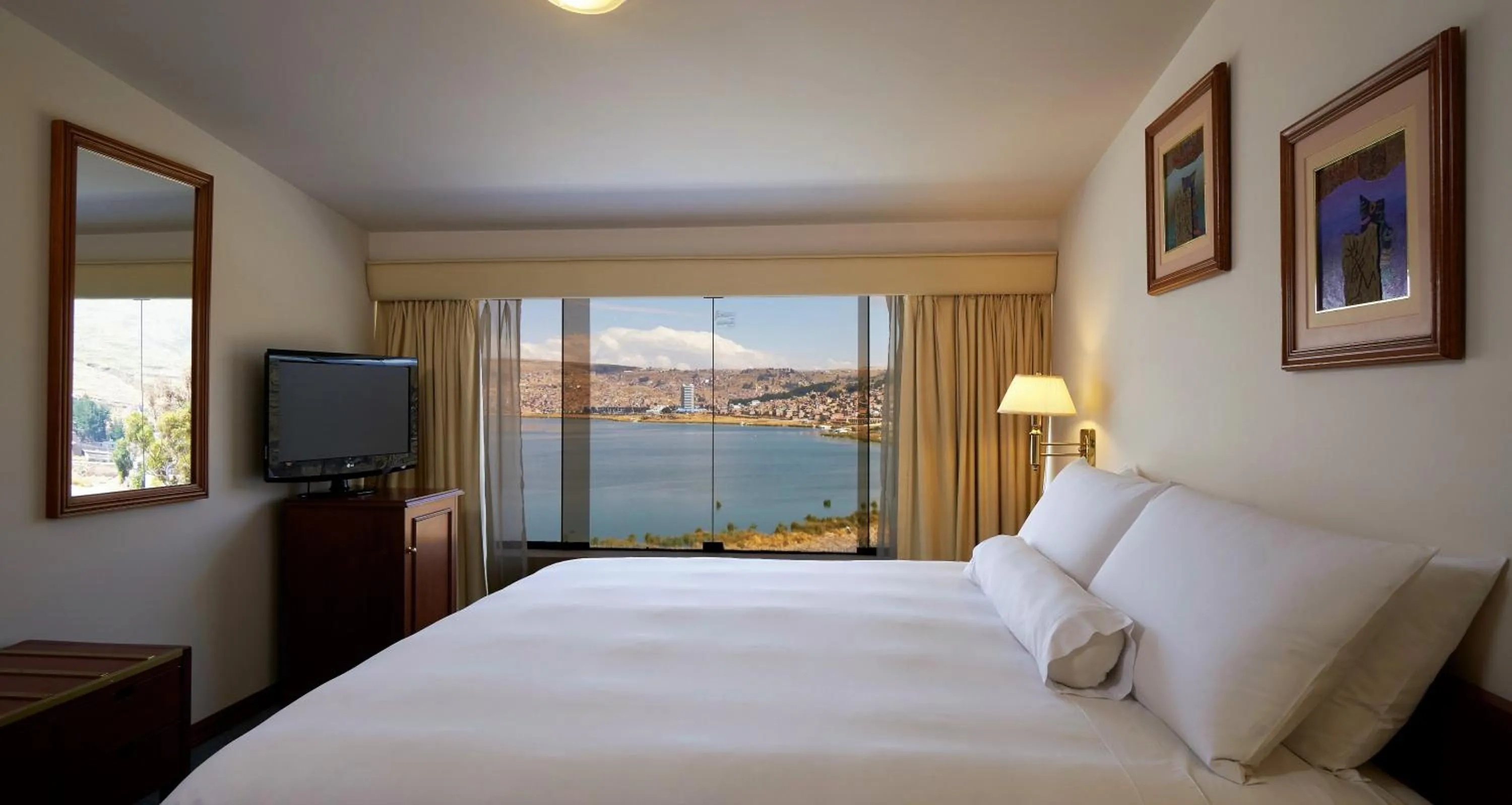 View (from property/room), Bed in GHL Hotel Lago Titicaca