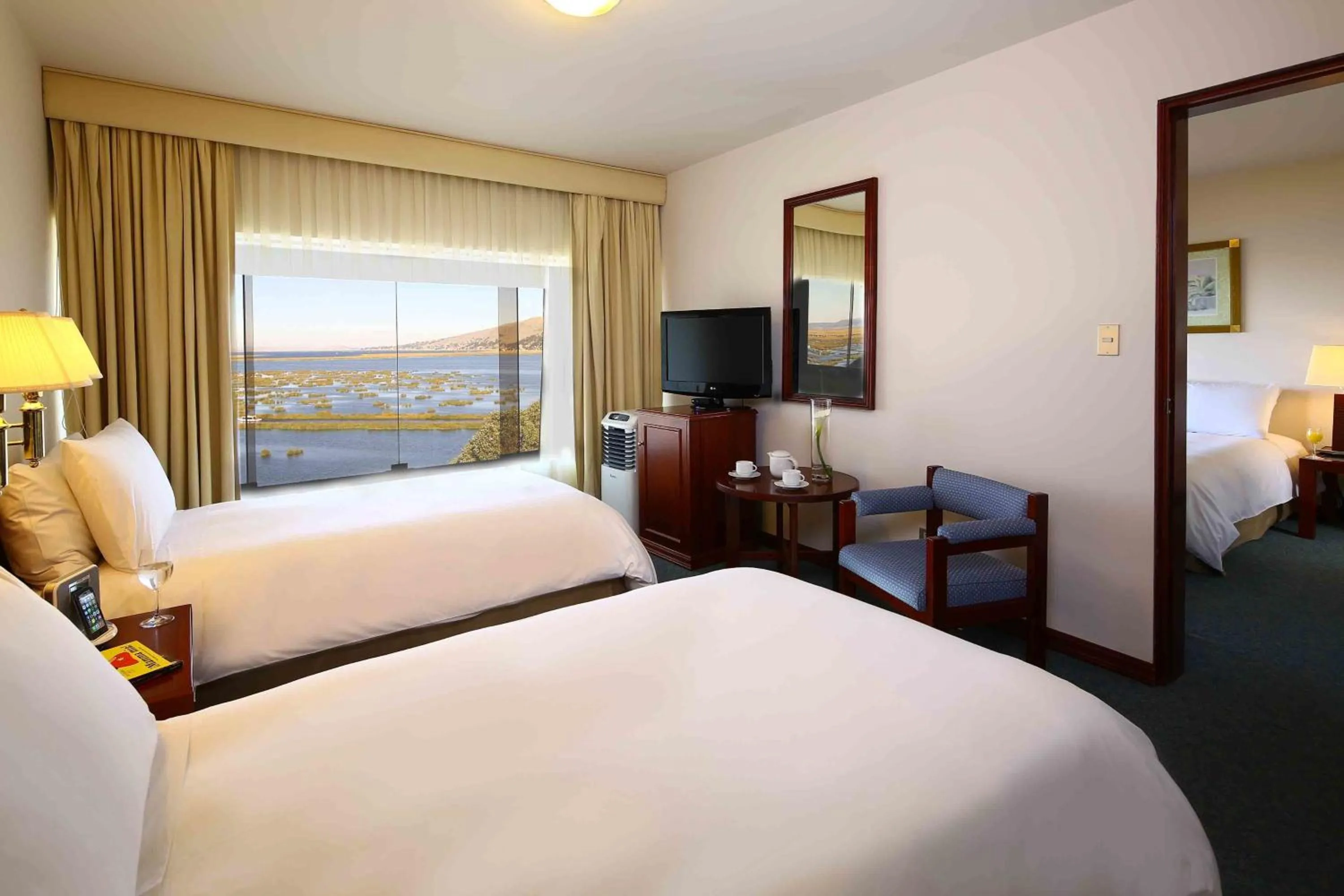 Photo of the whole room, Bed in GHL Hotel Lago Titicaca