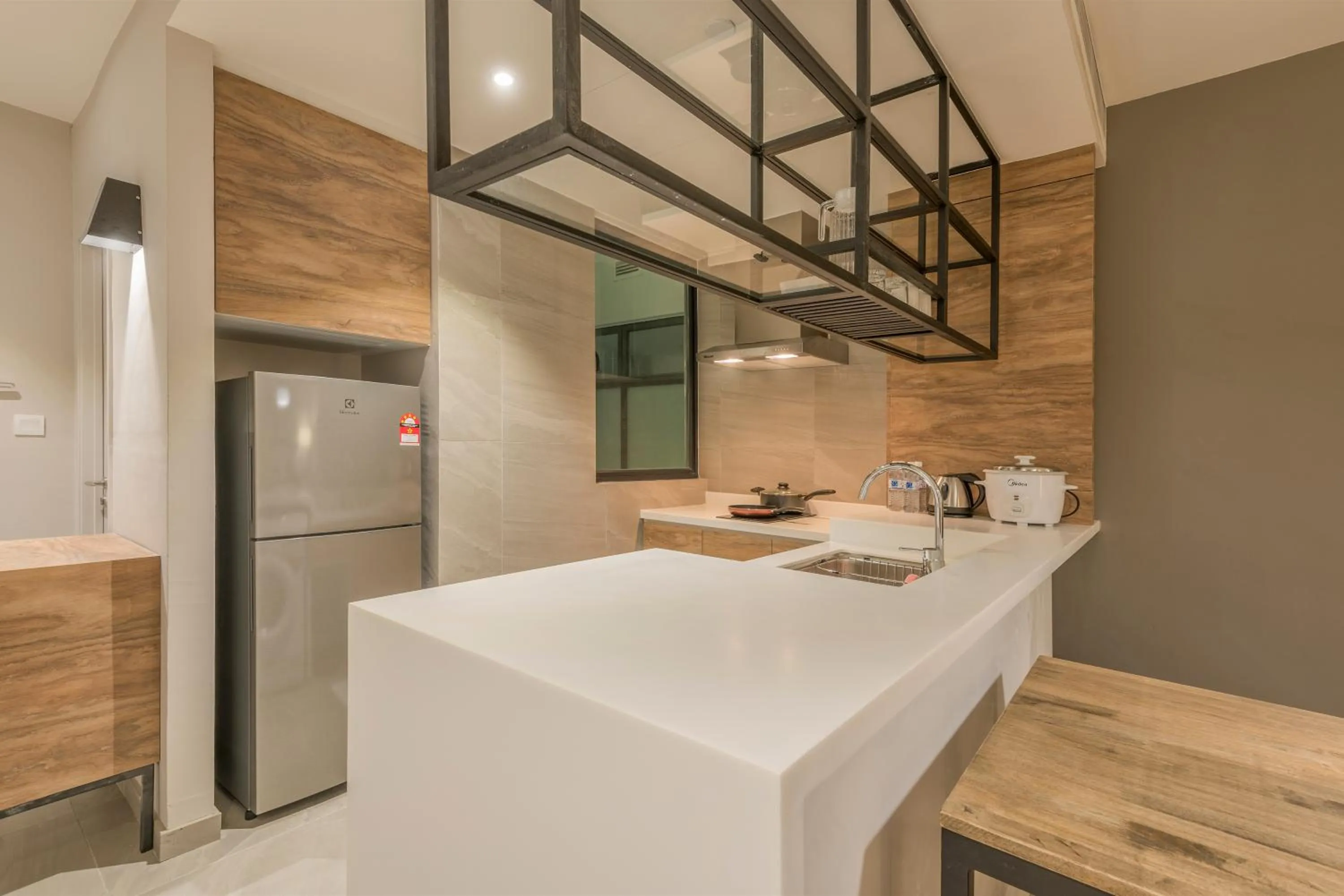 Kitchen or kitchenette in Jinhold Hotel & Serviced Apartment