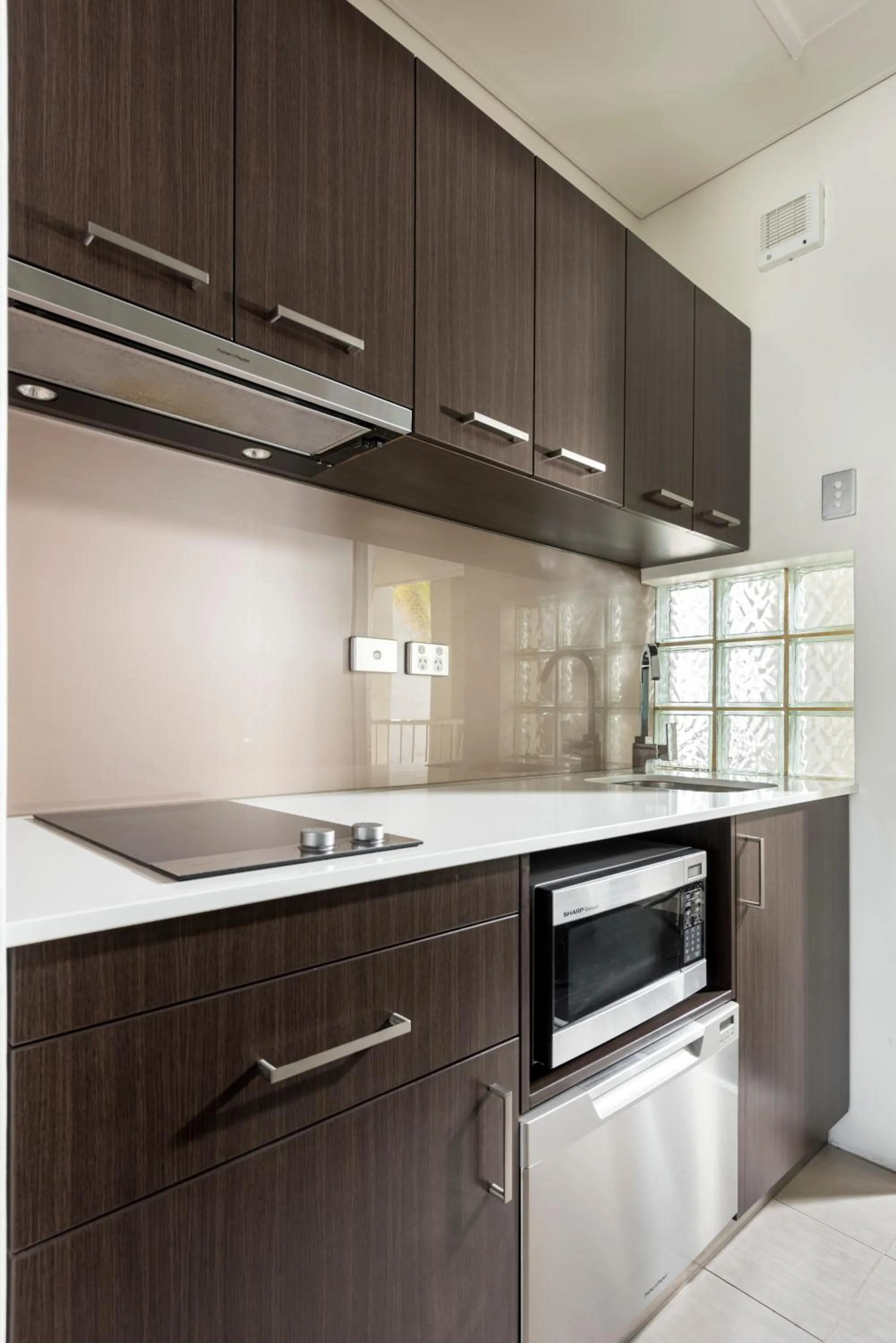 Kitchen or kitchenette in Pier 21 Riverside Apartment Hotel