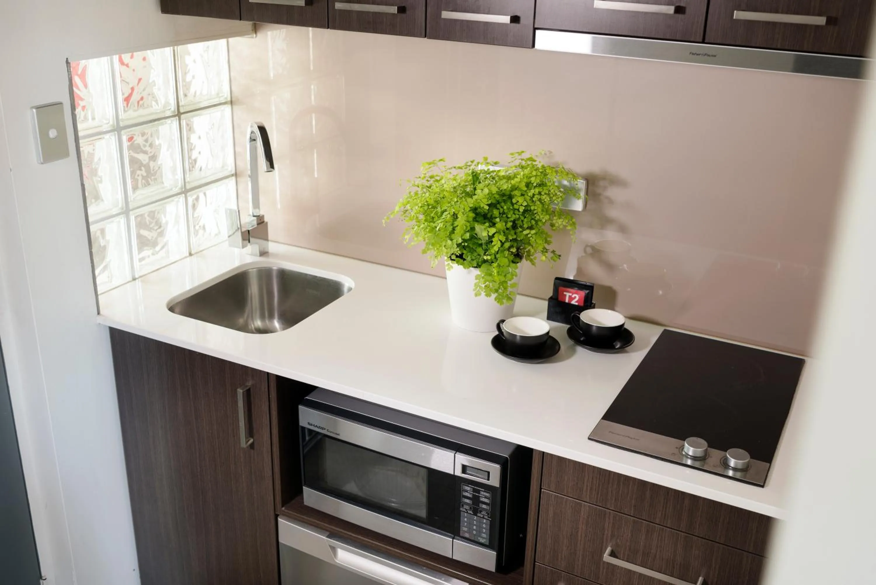 Kitchen or kitchenette in Pier 21 Riverside Apartment Hotel