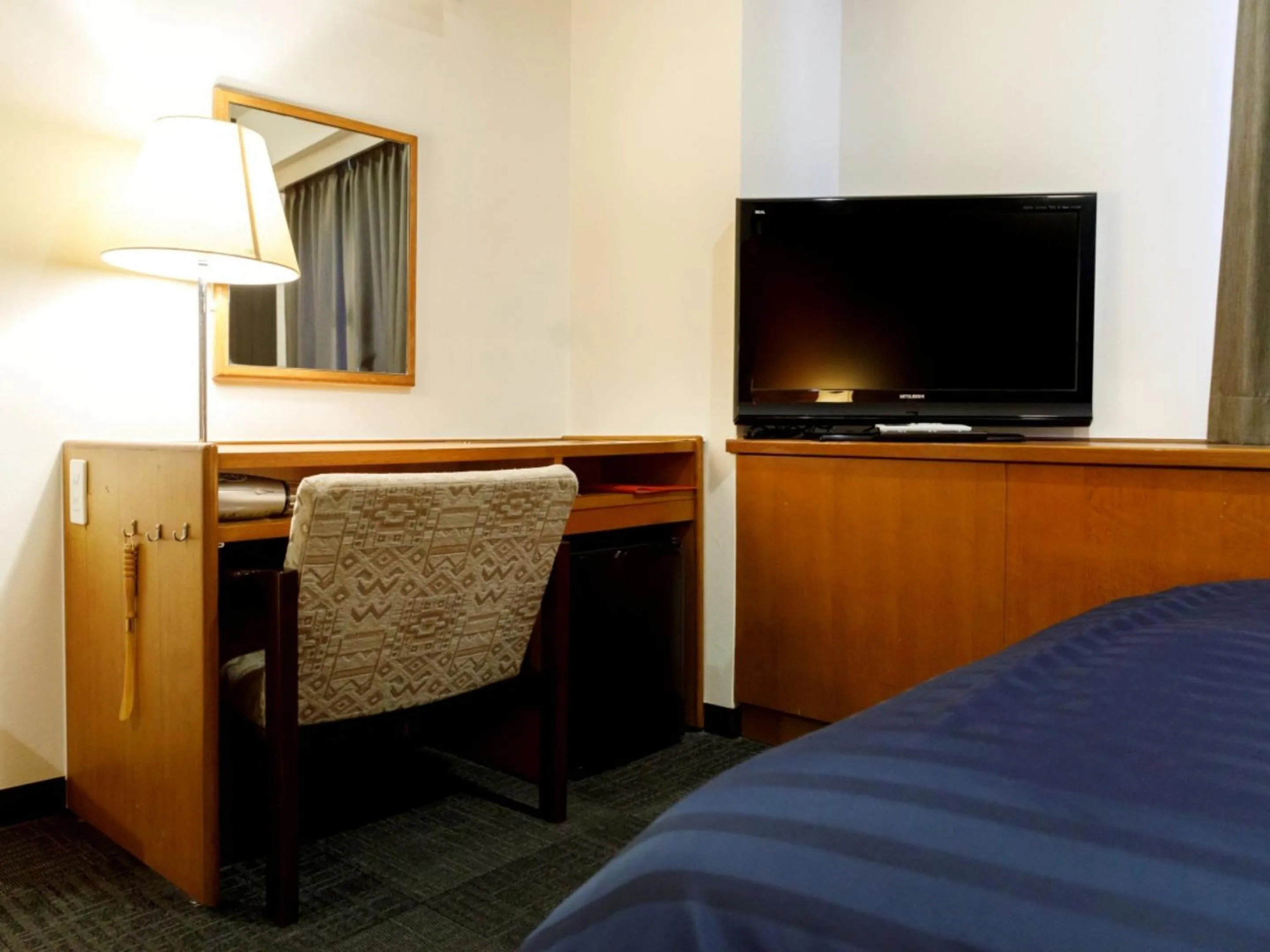 Bed in Miyazaki Lions Hotel