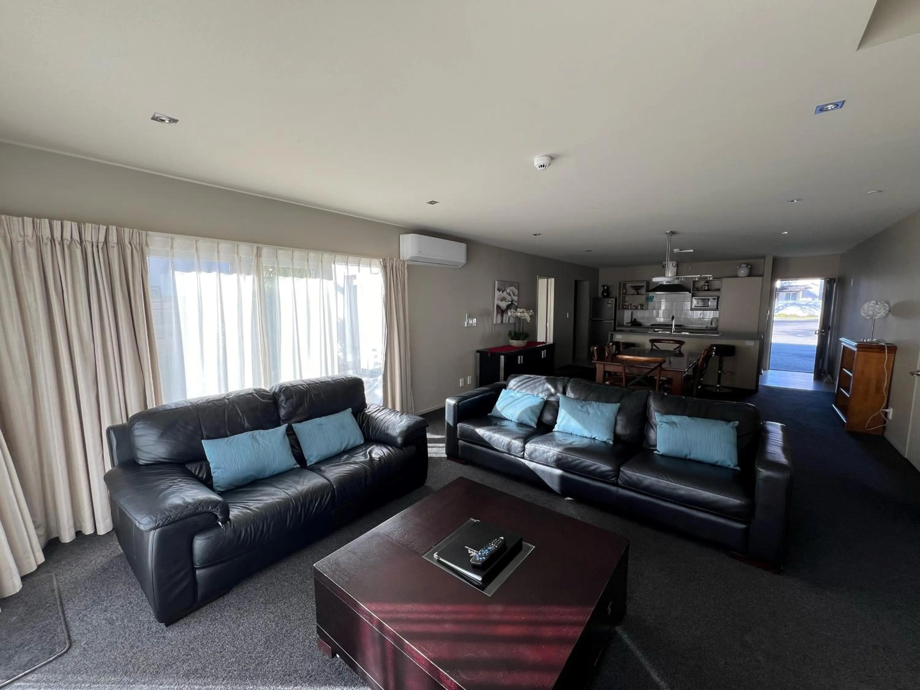 Living room in Airport Christchurch Motel