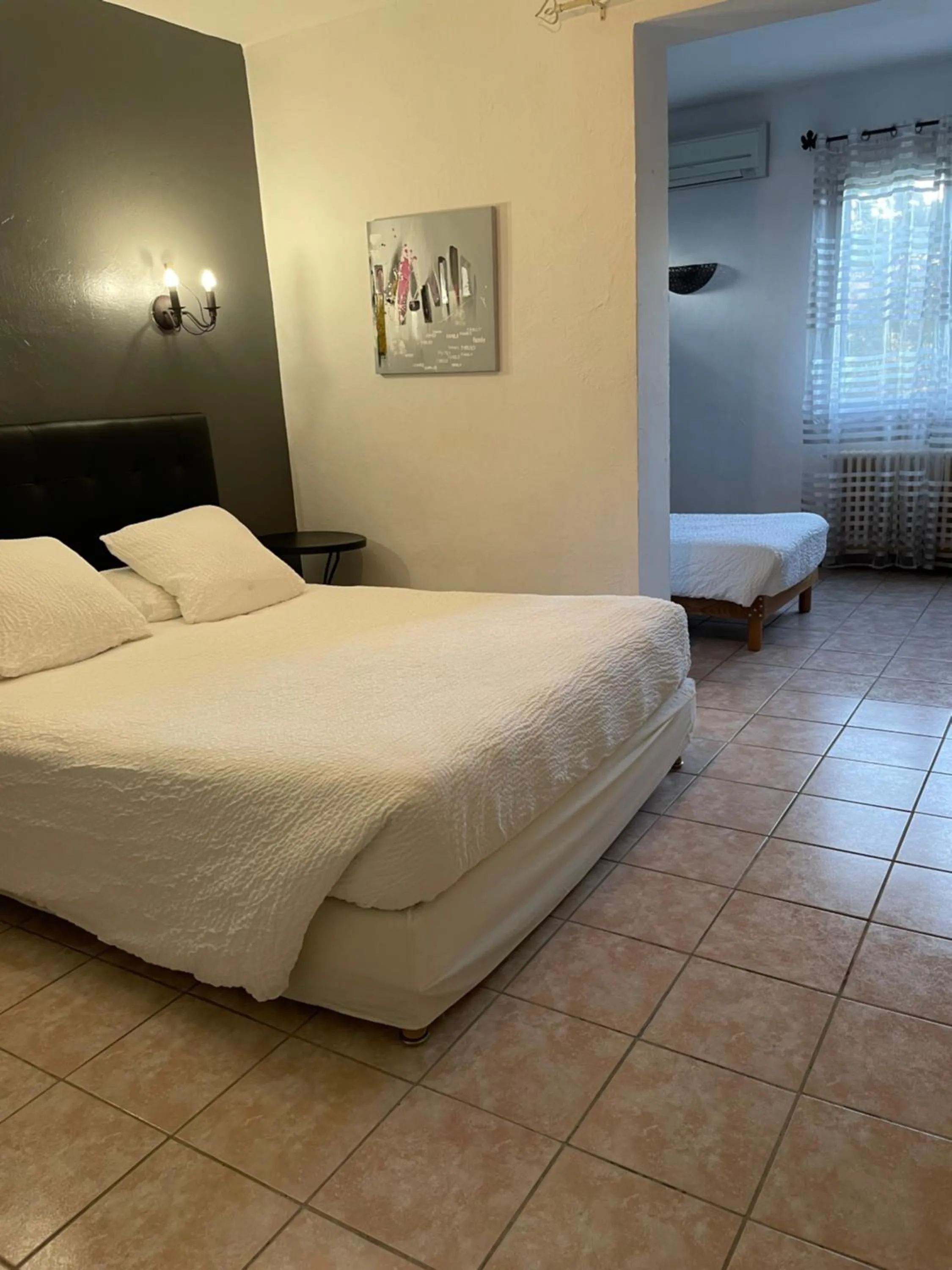 Bedroom, Bed in Logis Hôtel Le Clement V