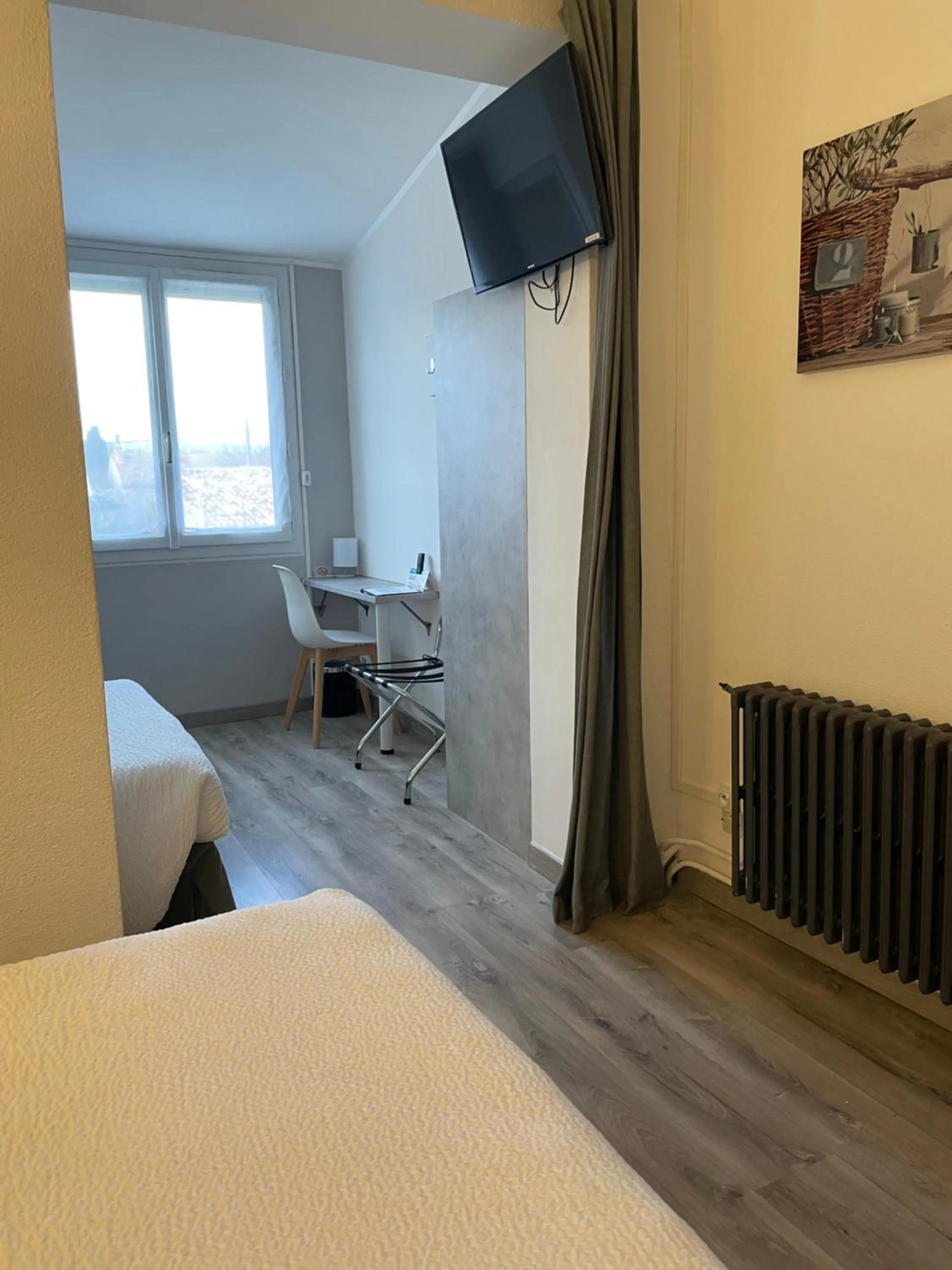 Bedroom, Bed in Logis Hôtel Le Clement V