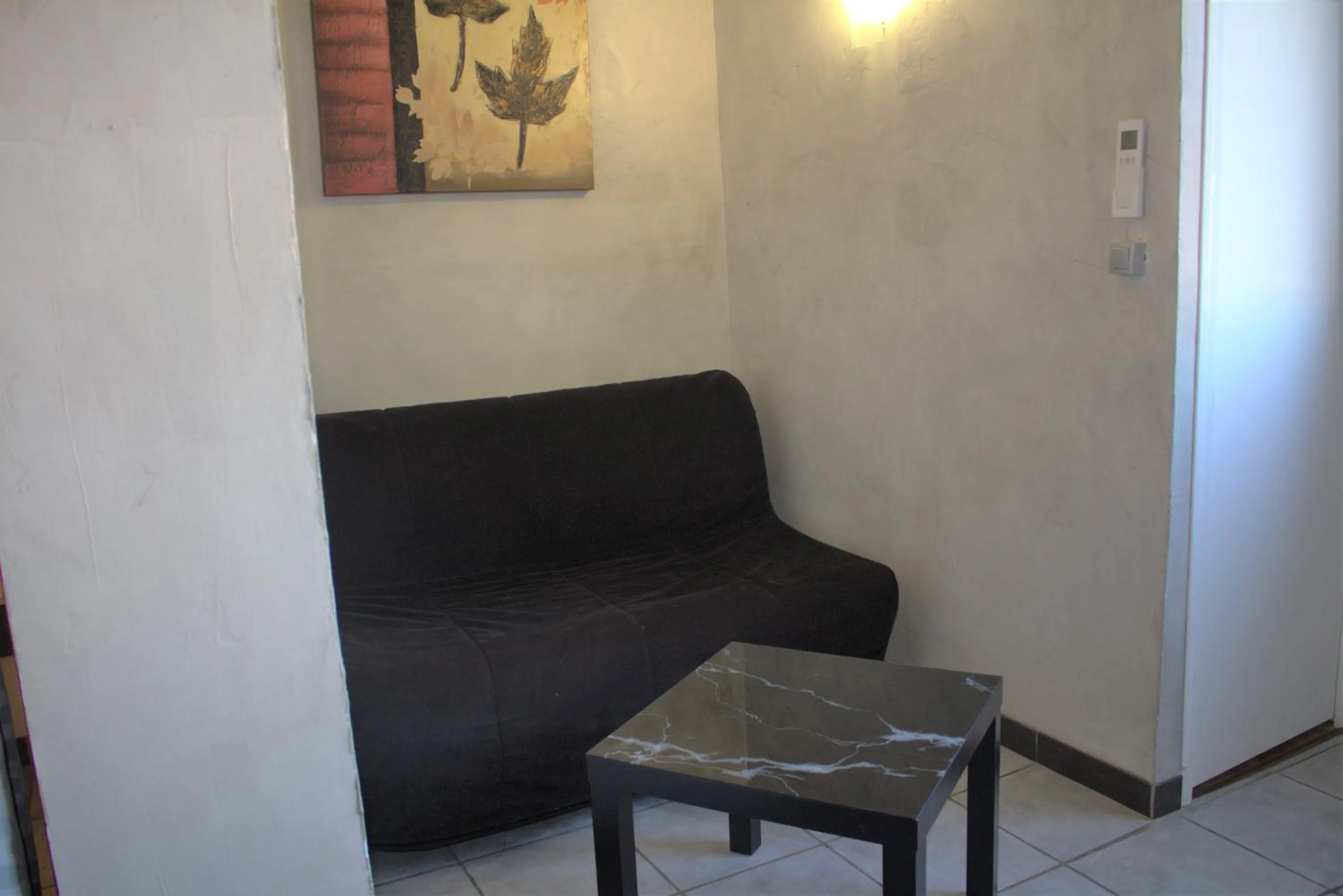 Living room in Logis Hôtel Le Clement V