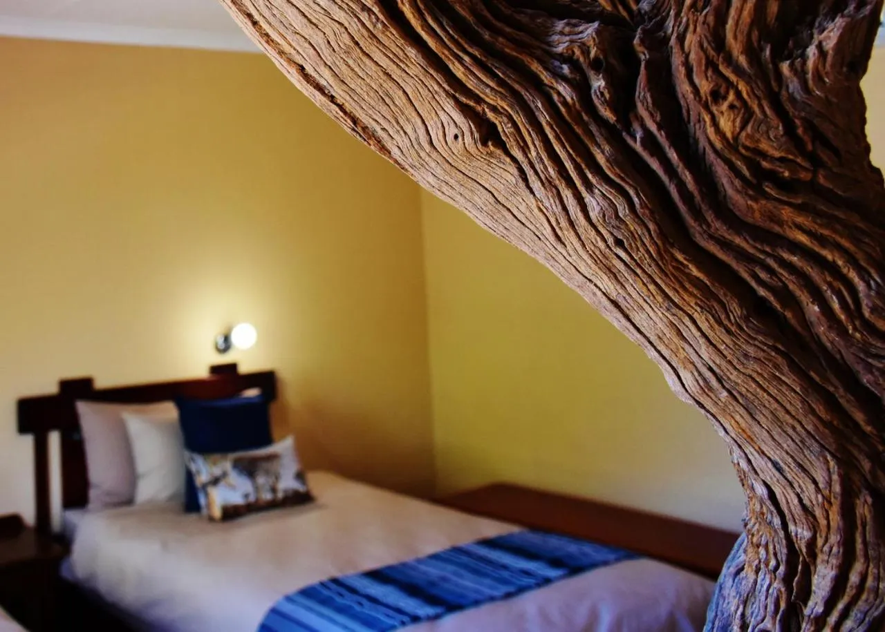 Decorative detail, Bed in Kamaku Guesthouse cc