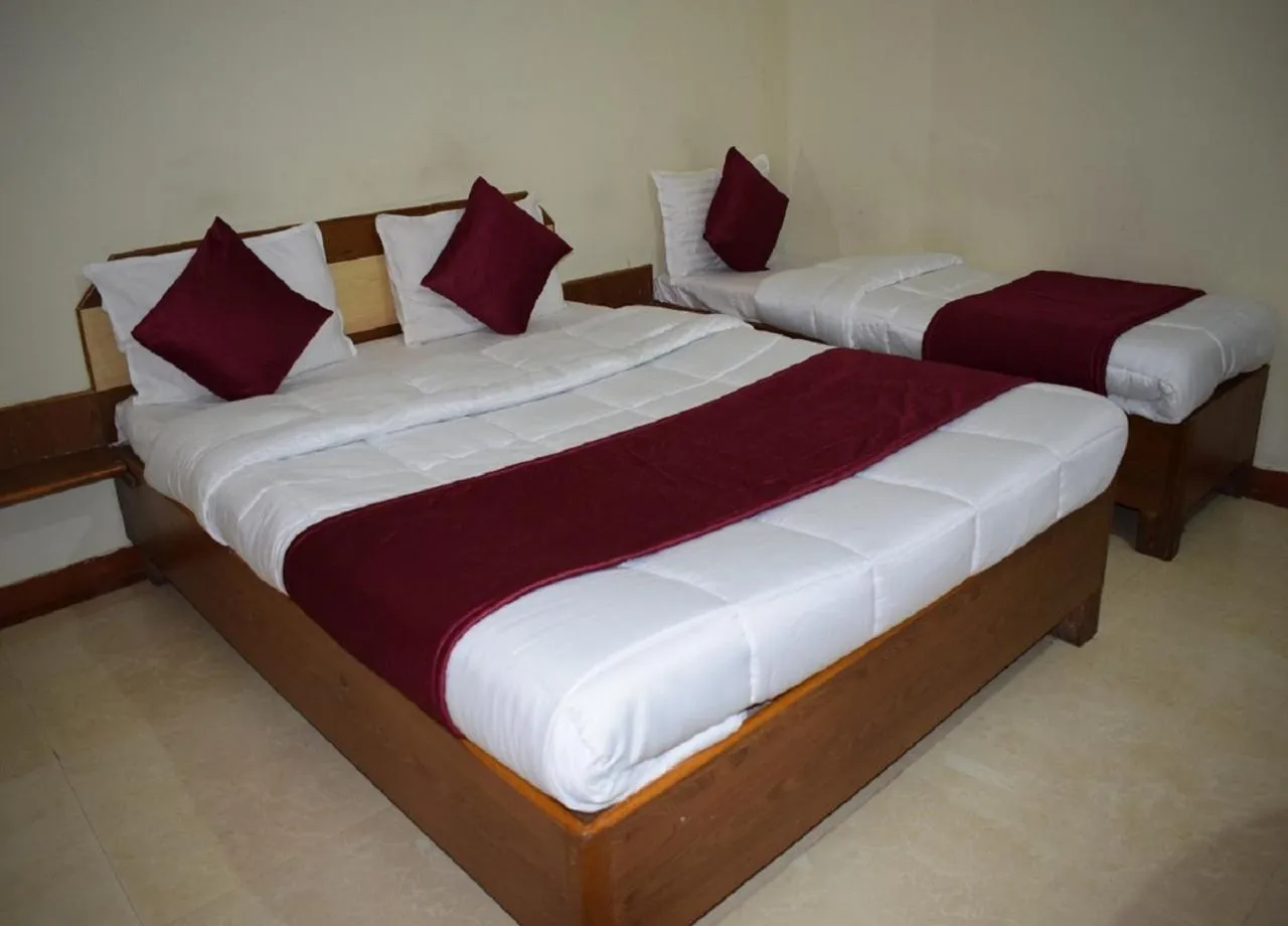 Bed in Manas Homestay by Sky Stays