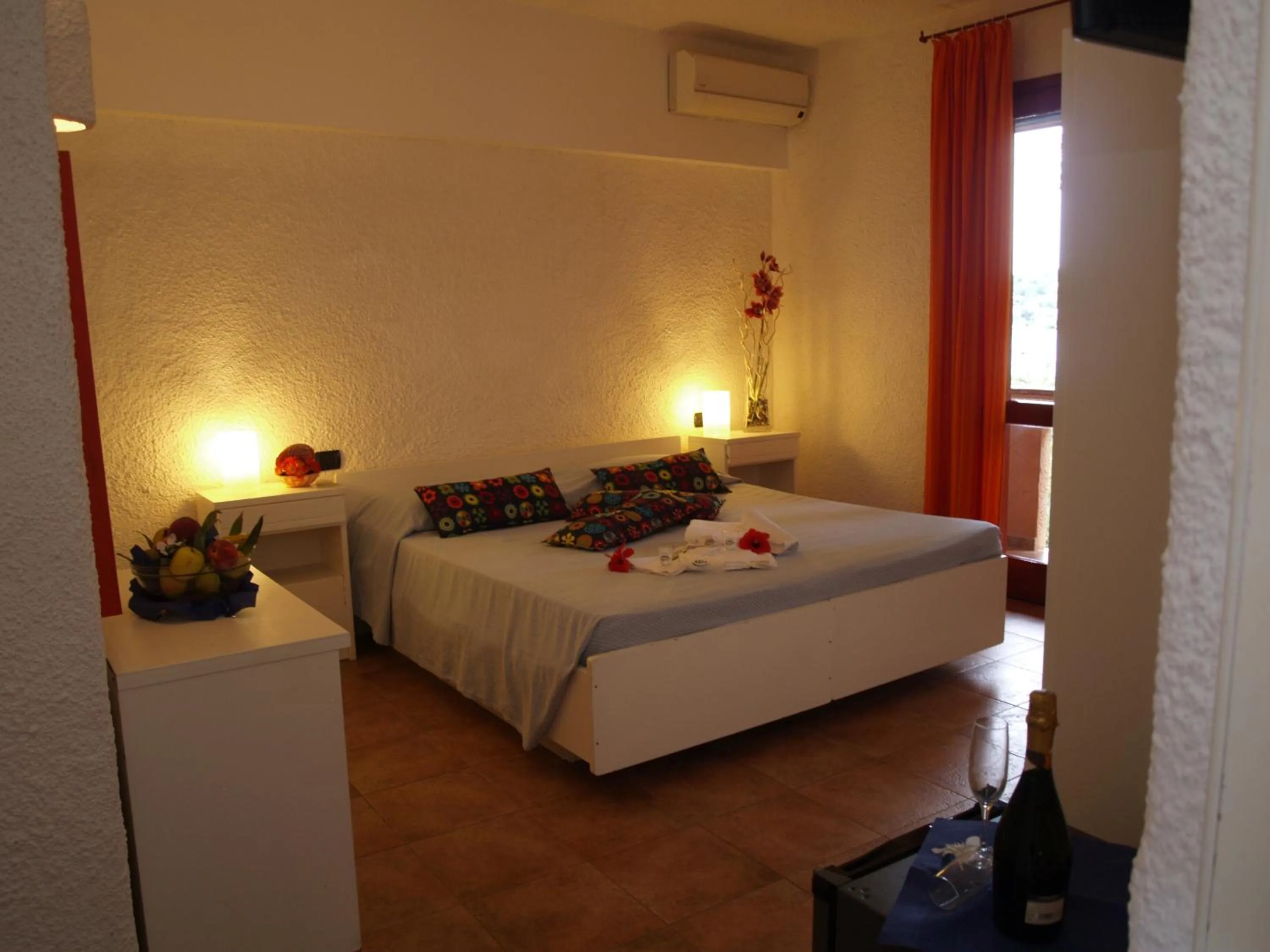 Bed in Club Esse Cala Bitta