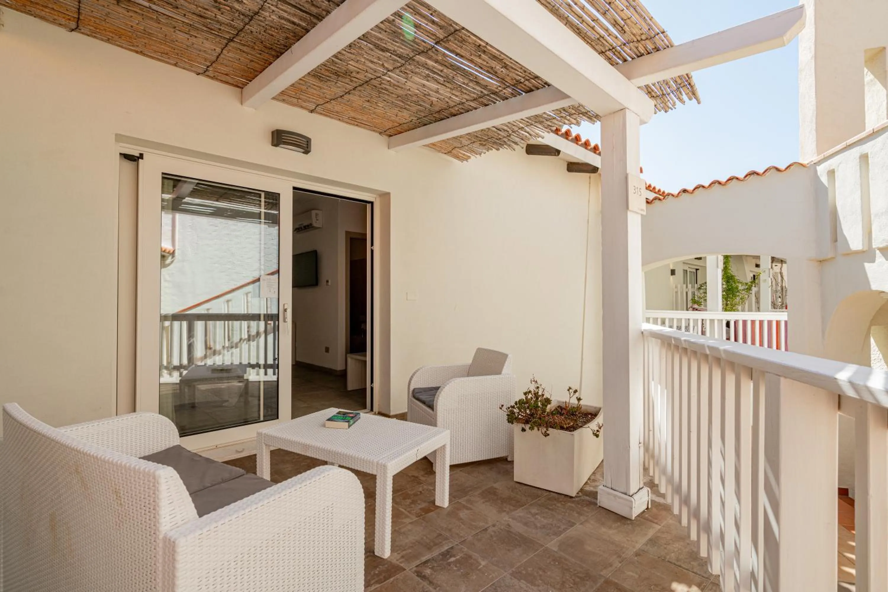 Bedroom in Club Esse Cala Bitta