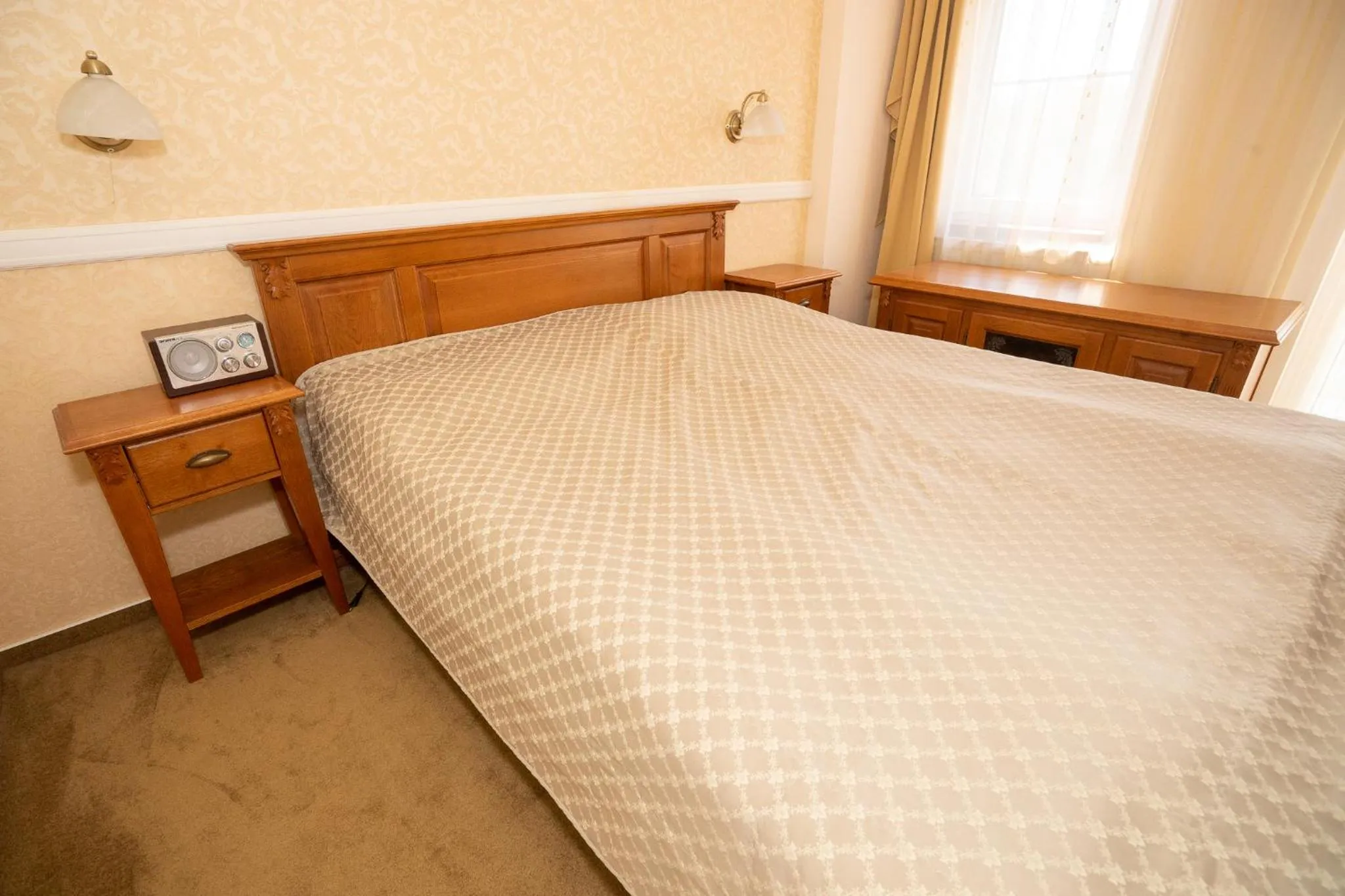 Bed in Hotel Dominika