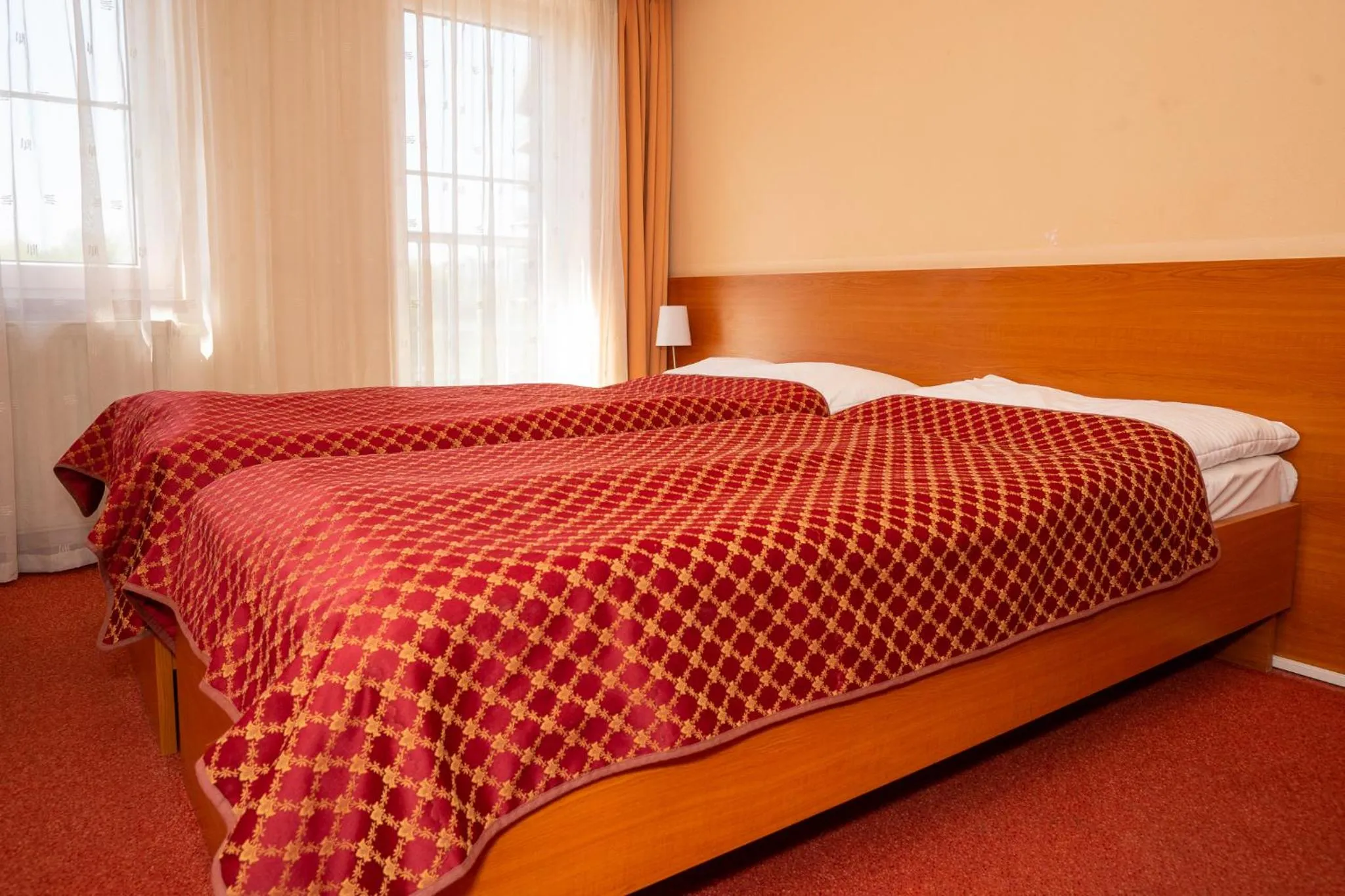 Bed in Hotel Dominika