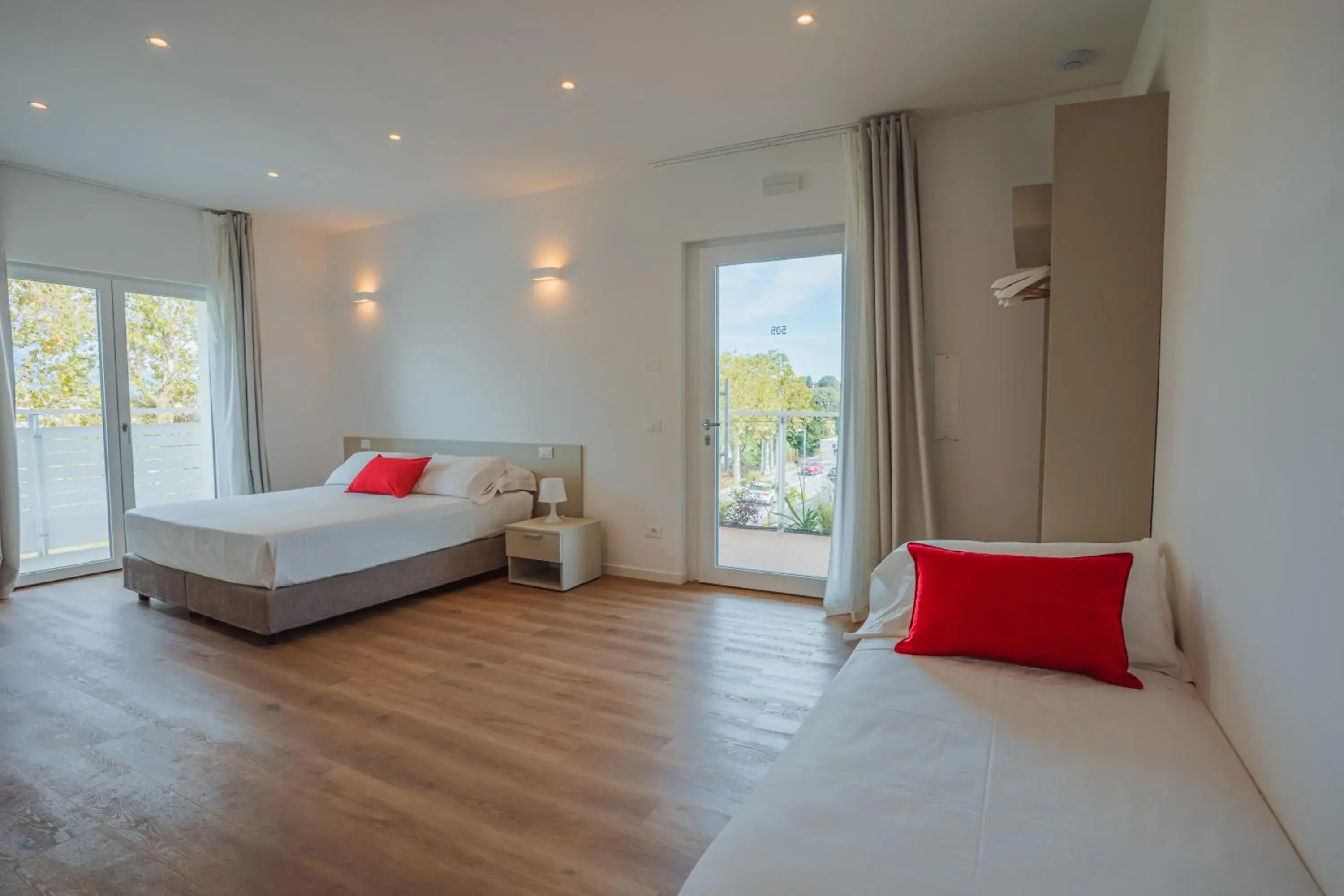 Deluxe Triple Room in Garda Relais Deluxe Triple Room in Garda Relais