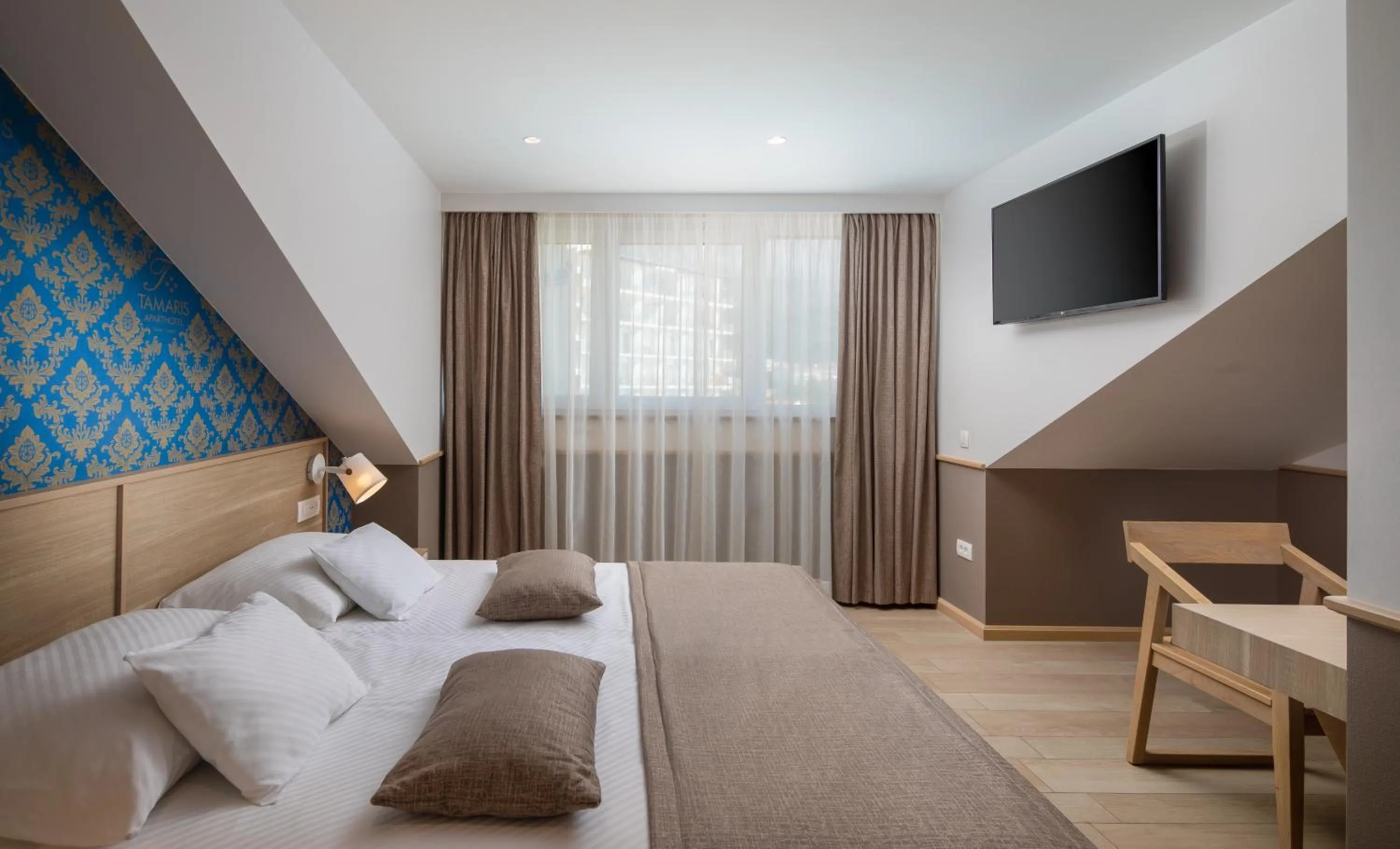 Bed in Hotel Tamaris