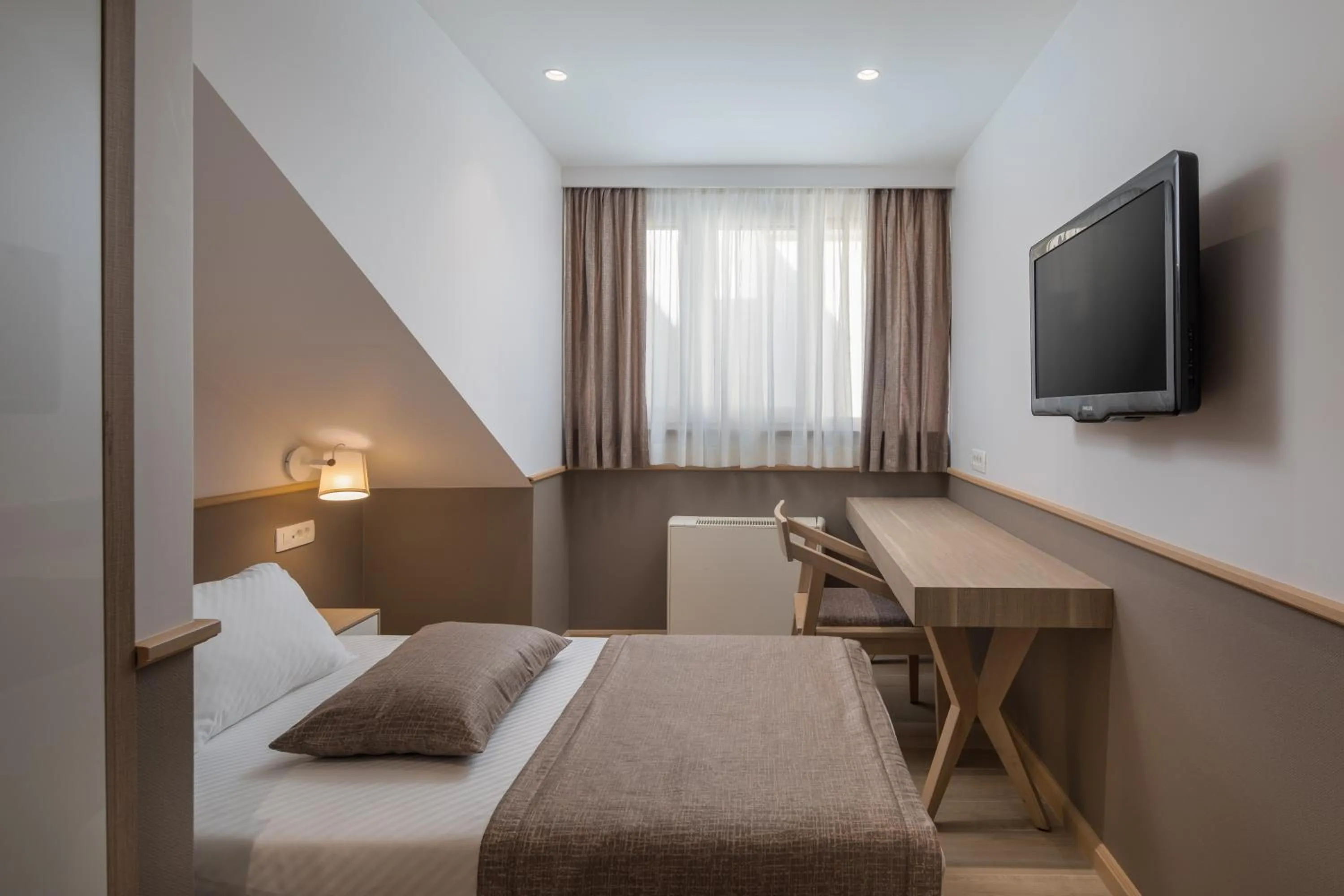 Bed in Hotel Tamaris