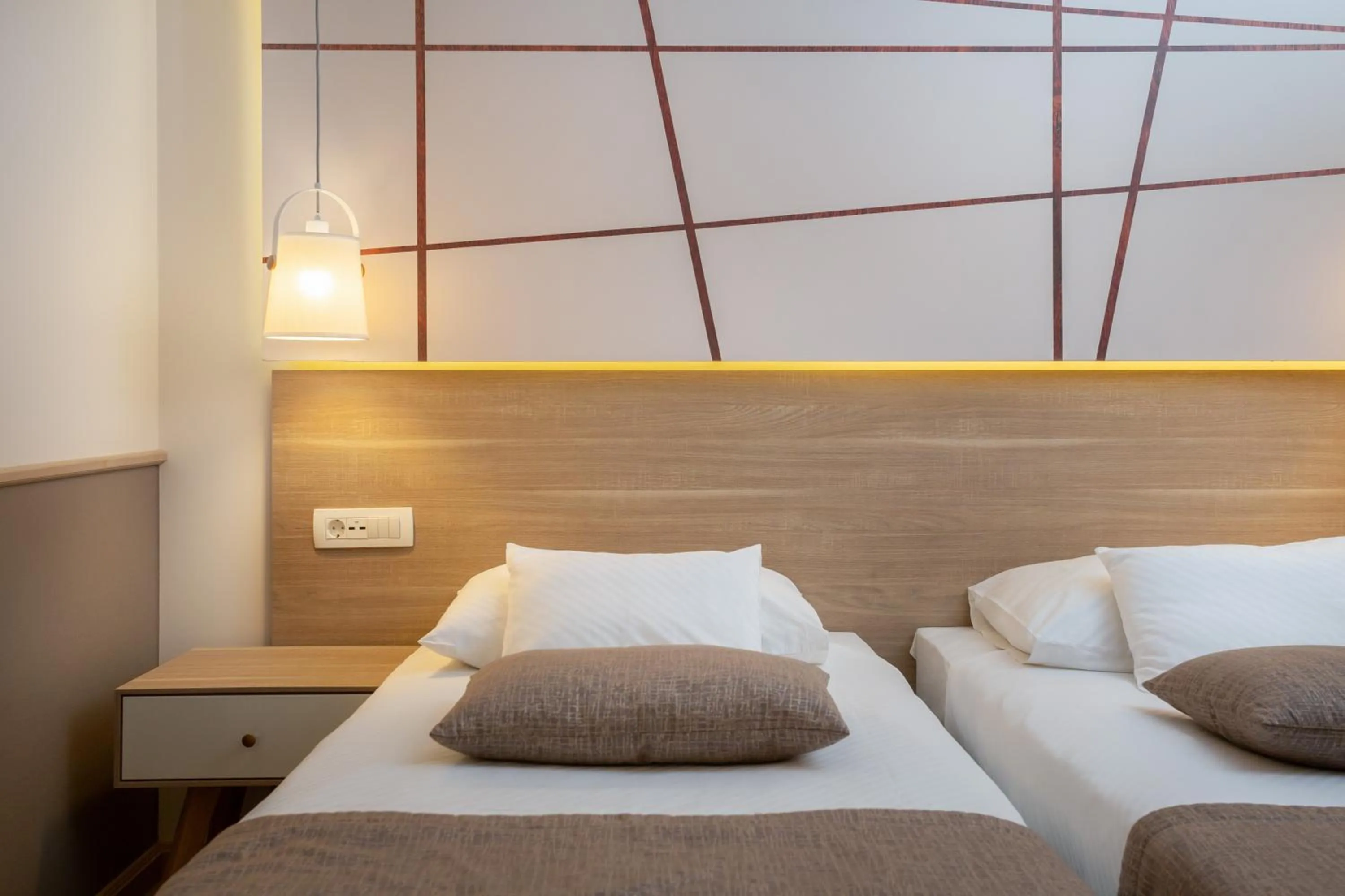 Bed in Hotel Tamaris