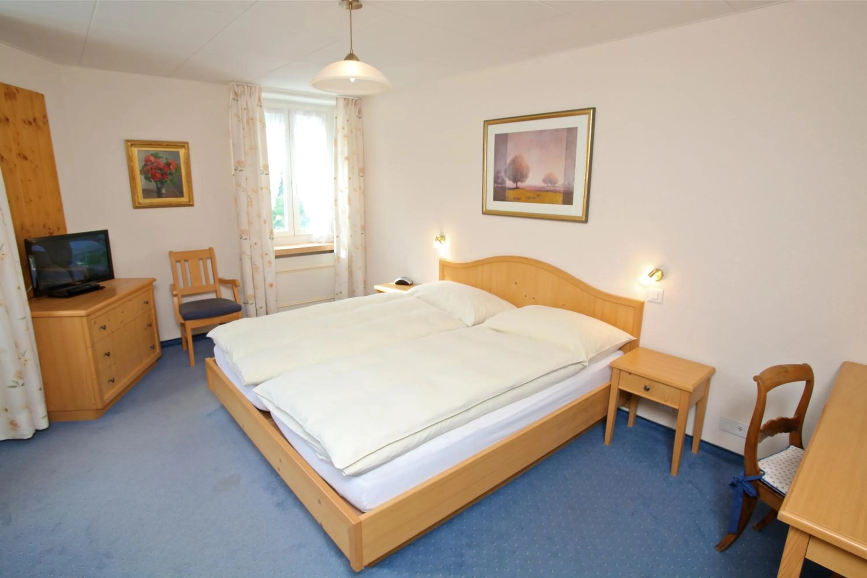 Bed in Hôtel du Cerf