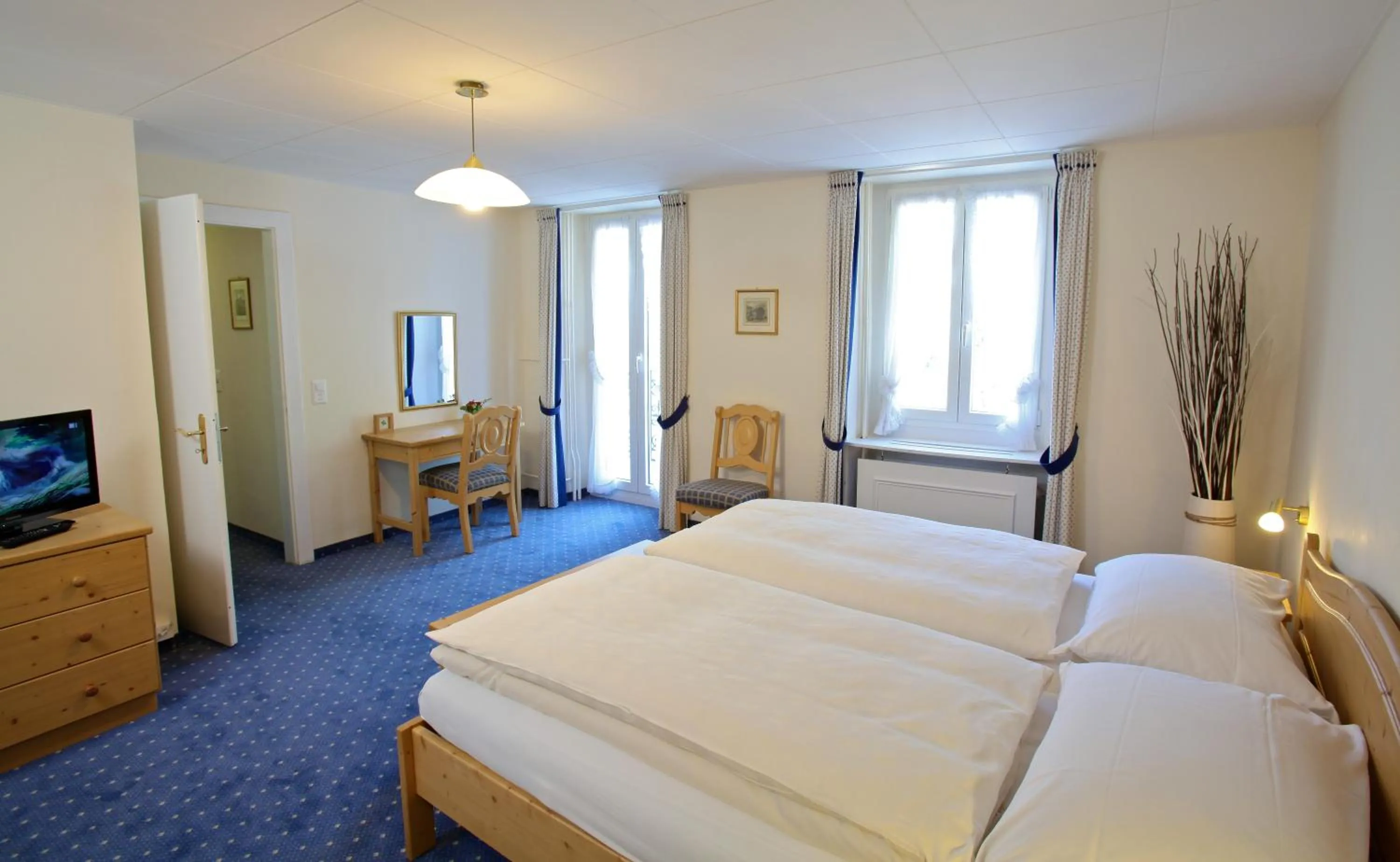 Bed in Hôtel du Cerf