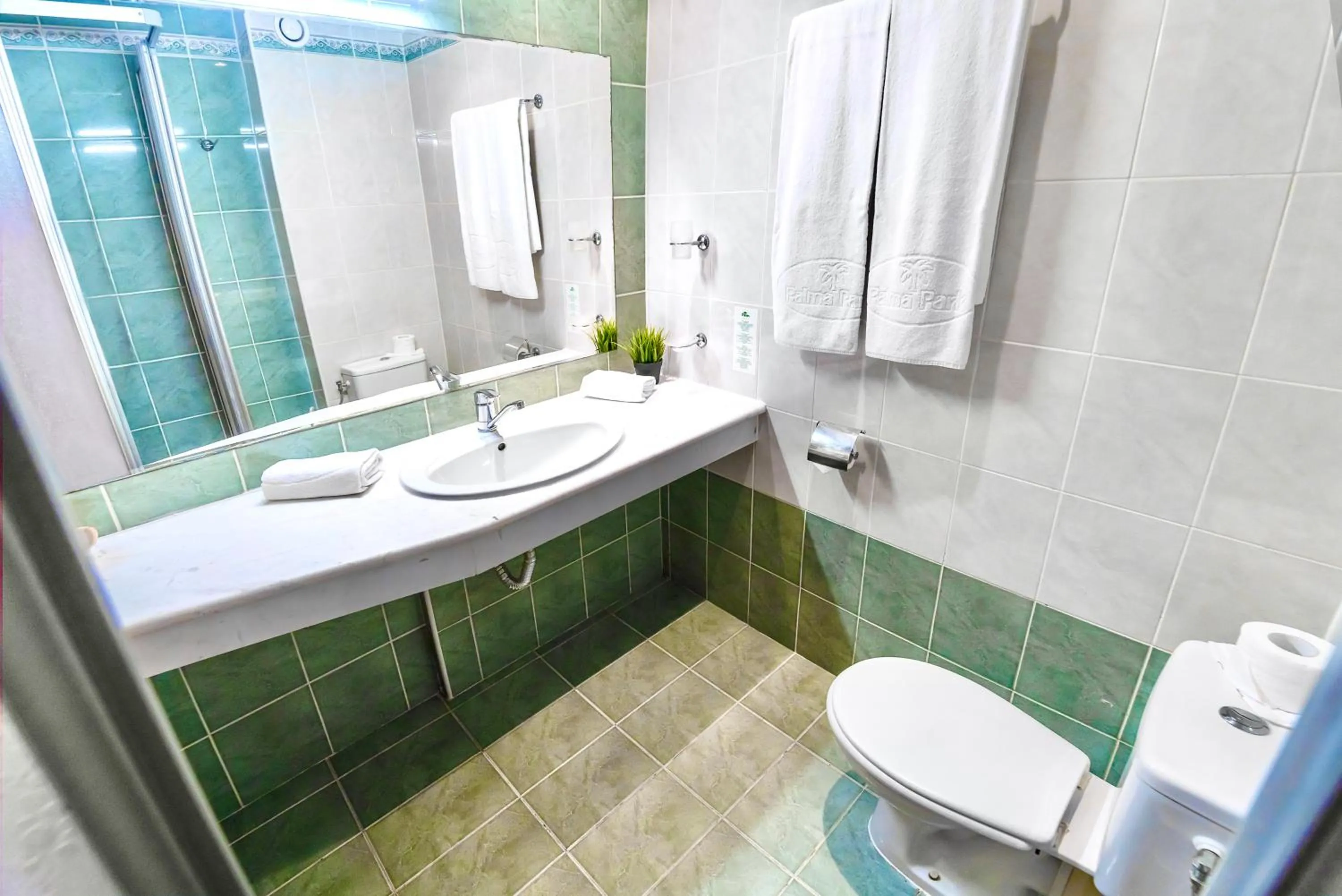 Bathroom in Palm Beach Hotel - All Inclusive with Free beach package & Private Beach