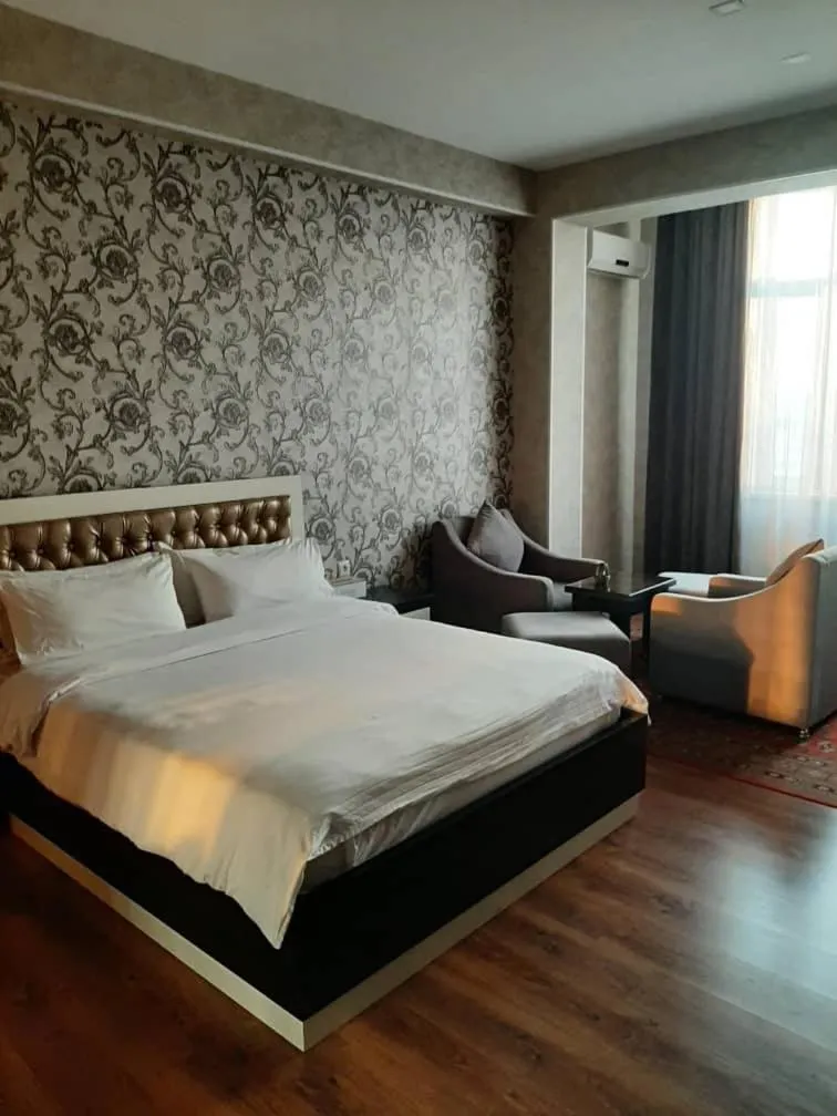 Bed in Sunrise Apartments