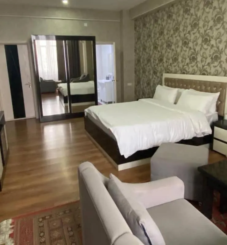 Bed in Sunrise Apartments