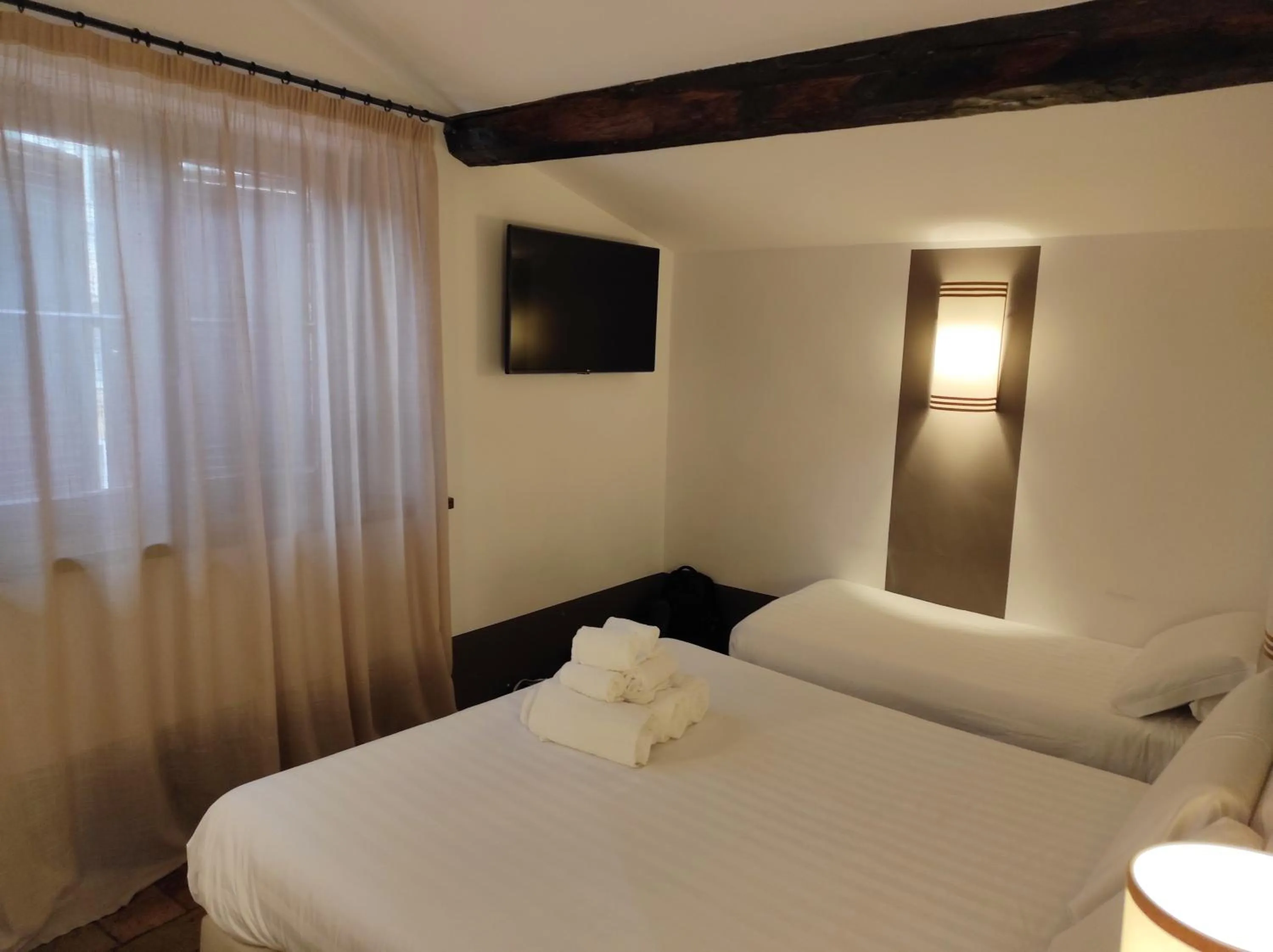 Bed in Relais Santa Maria Maggiore