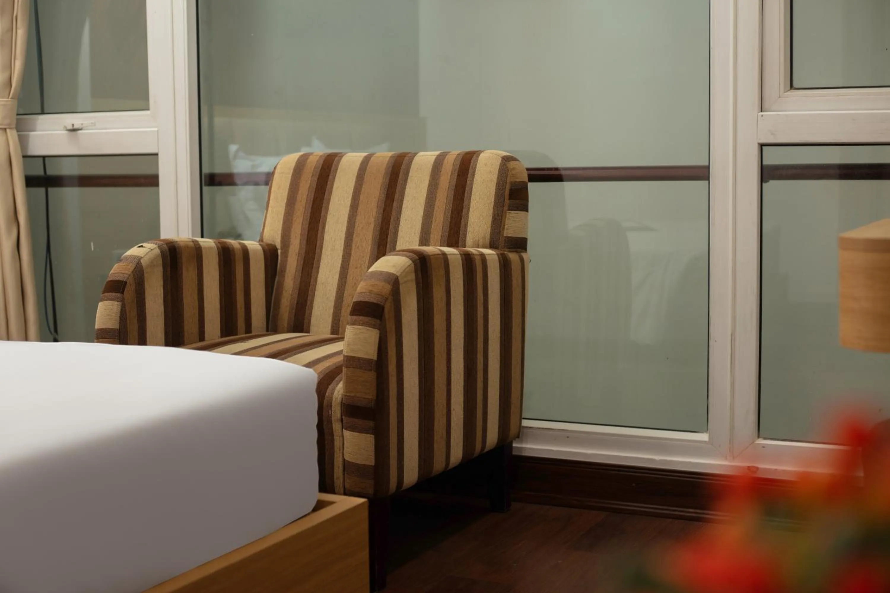 Seating area, Bed in Millennium Hanoi Hotel