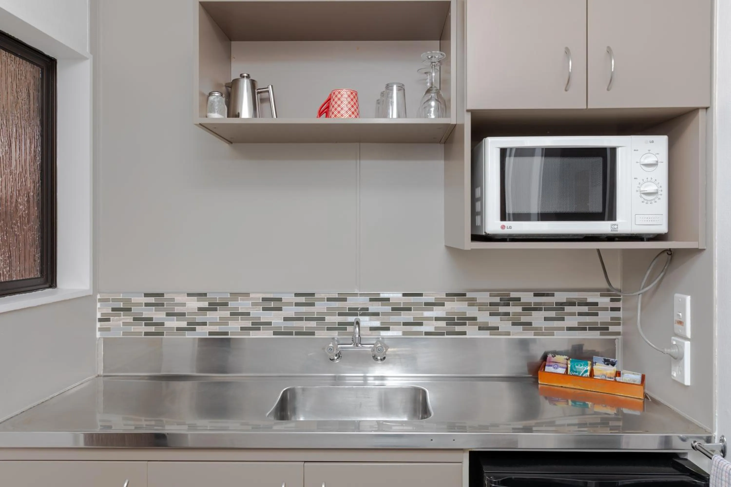 Kitchen or kitchenette in Amber Court Motel Nelson