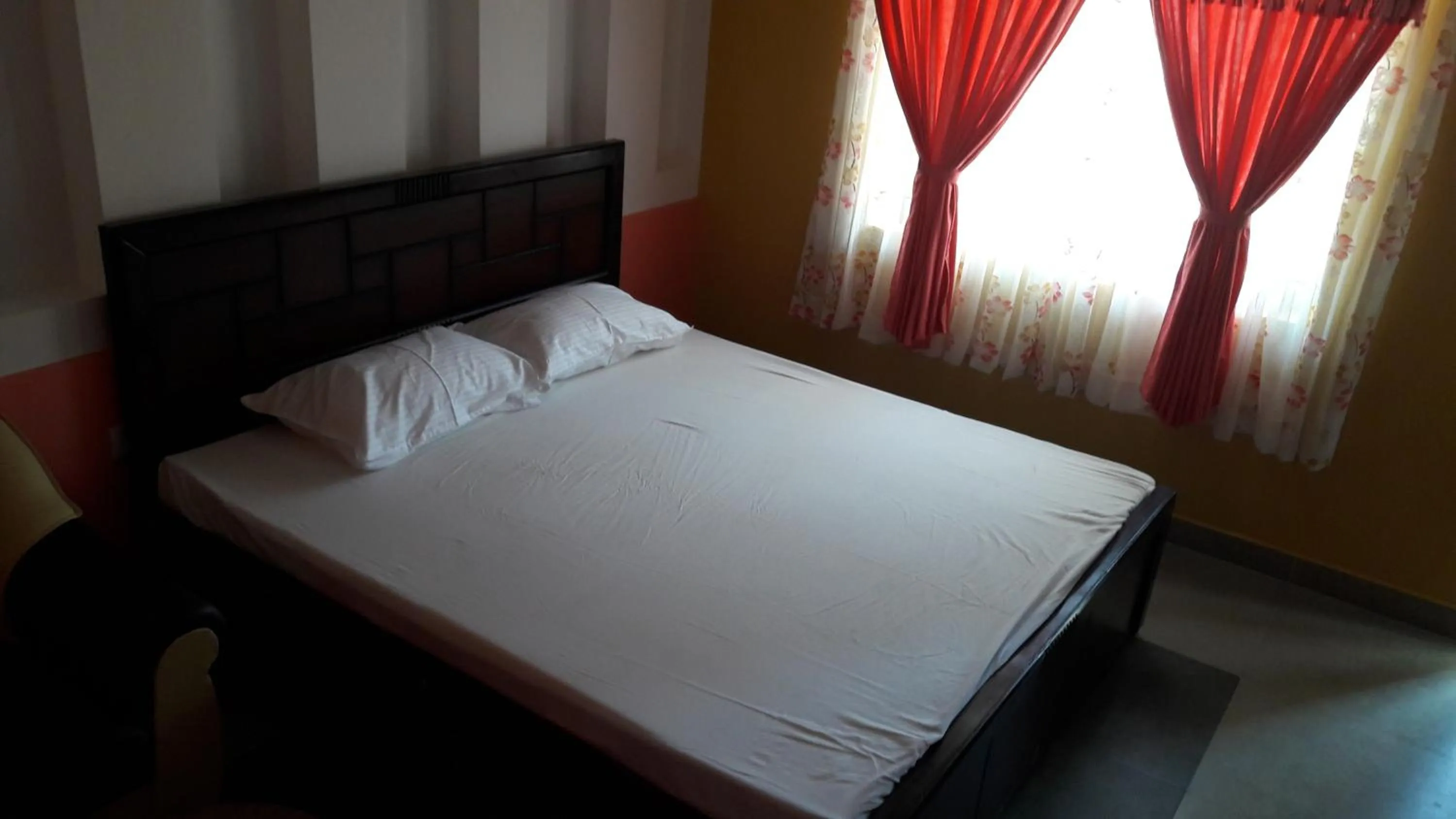 Bed in KBS Sree Paradise Kodai