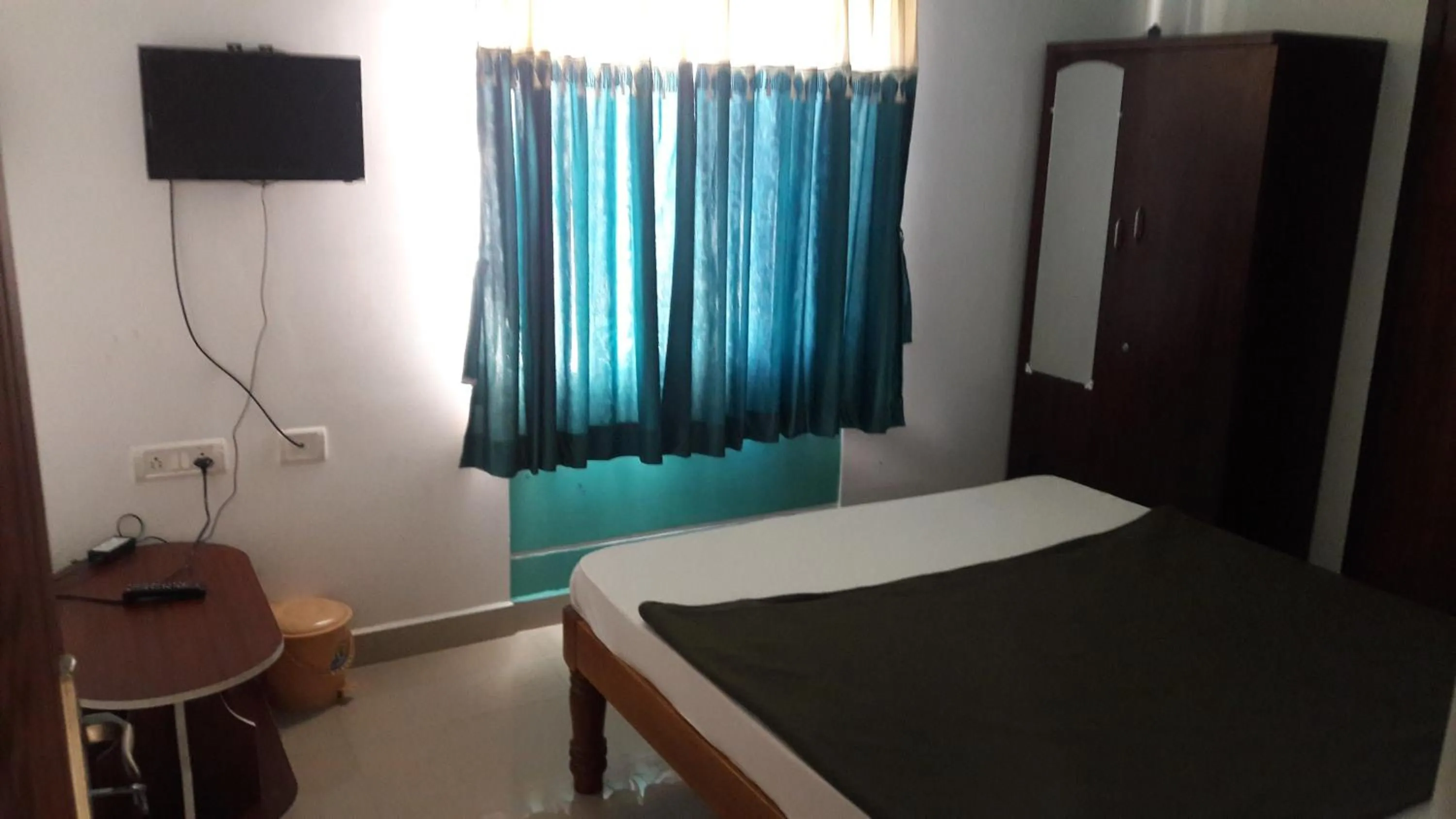 Bed in KBS Sree Paradise Kodai