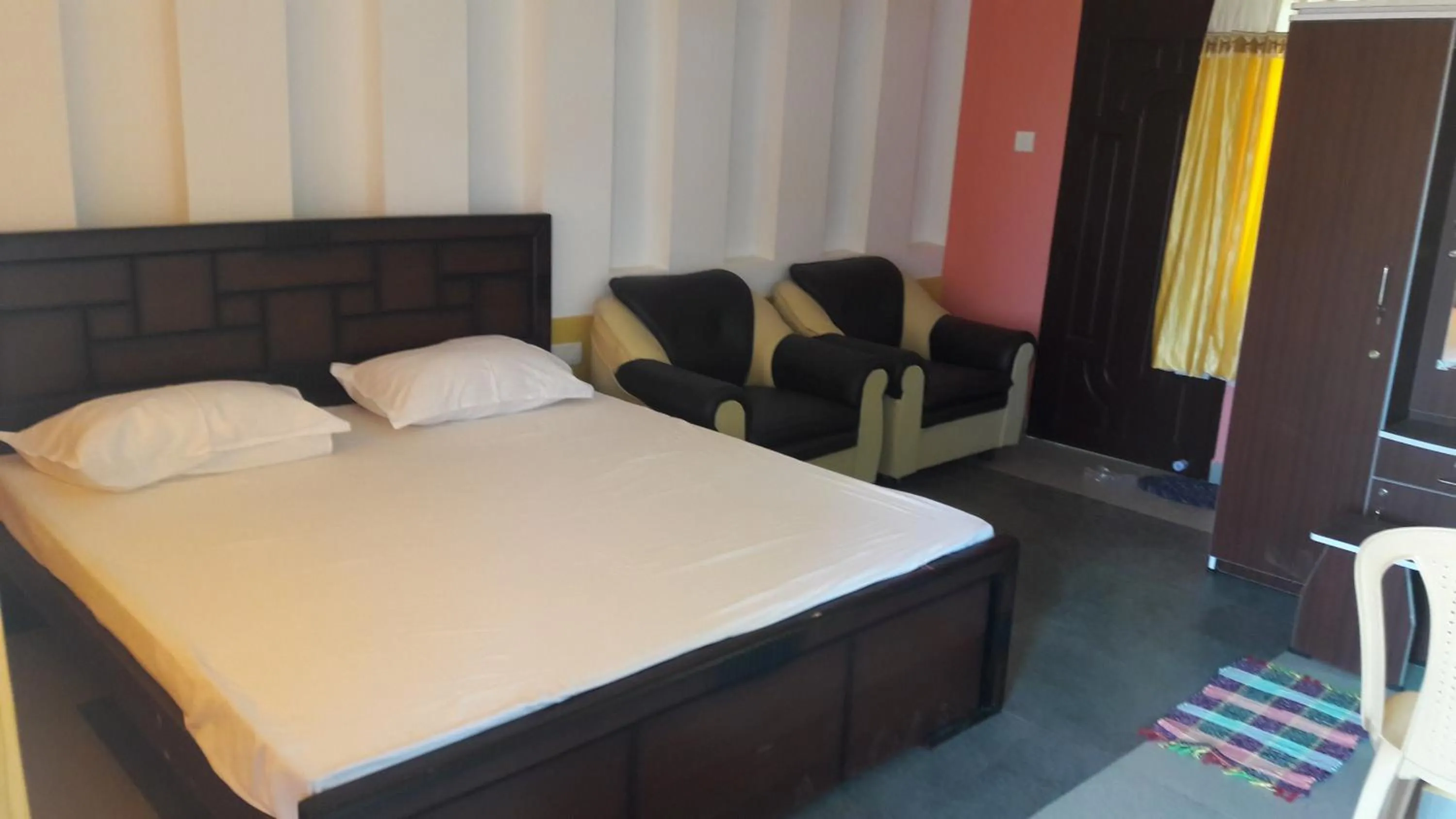 Bed in KBS Sree Paradise Kodai