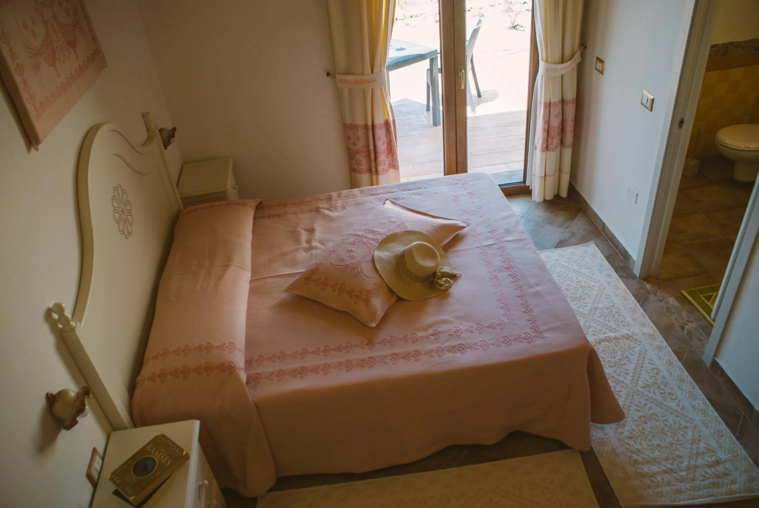 Patio, Bed in Hotel Barbagia