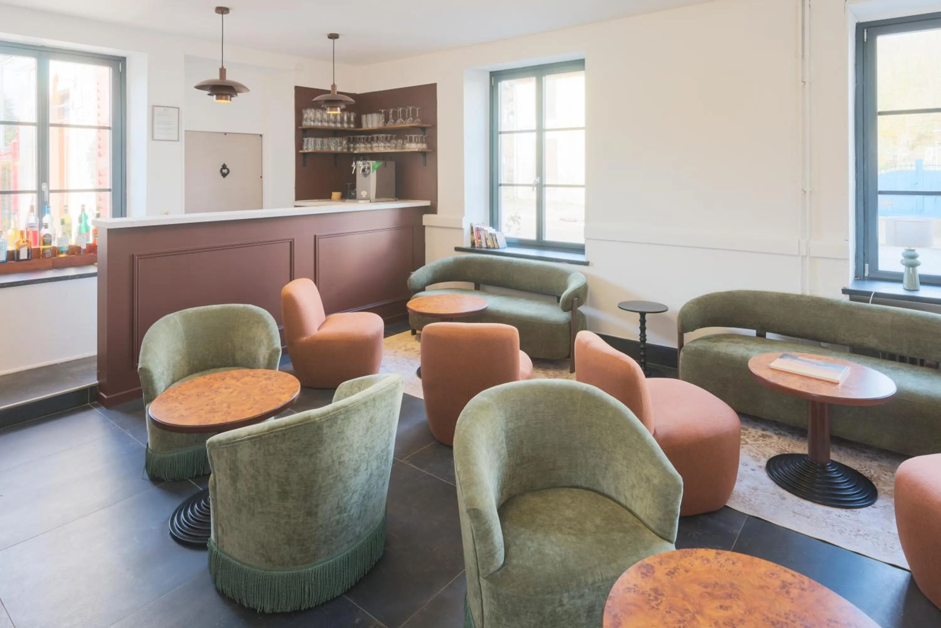Seating area in Logis Hostellerie la Chaumière