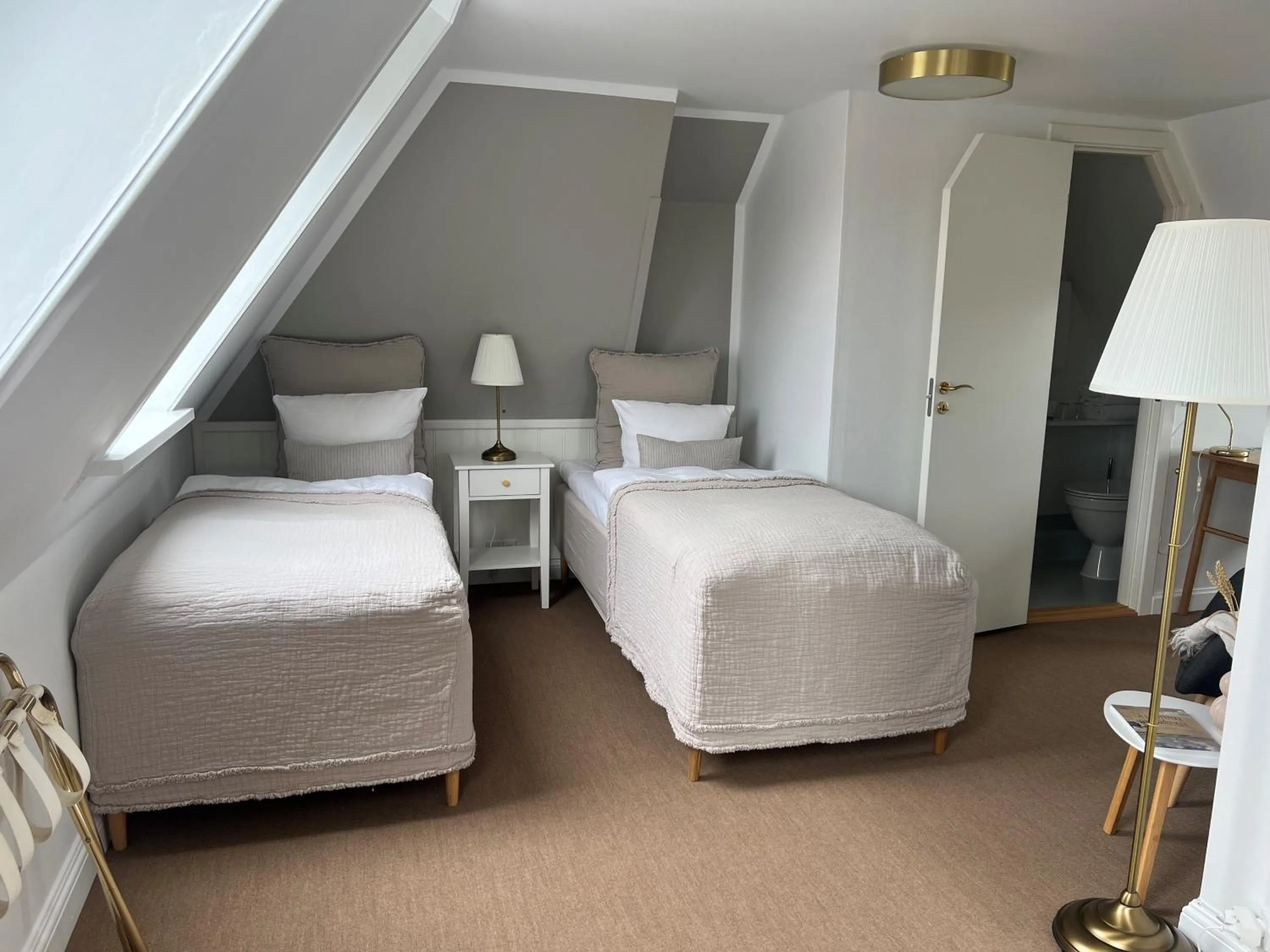 Property building, Bed in Hotel Strandly Skagen