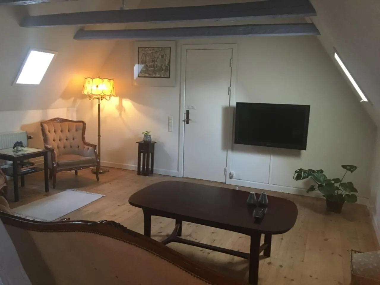 Communal lounge/ TV room in Den Gamle Arrest