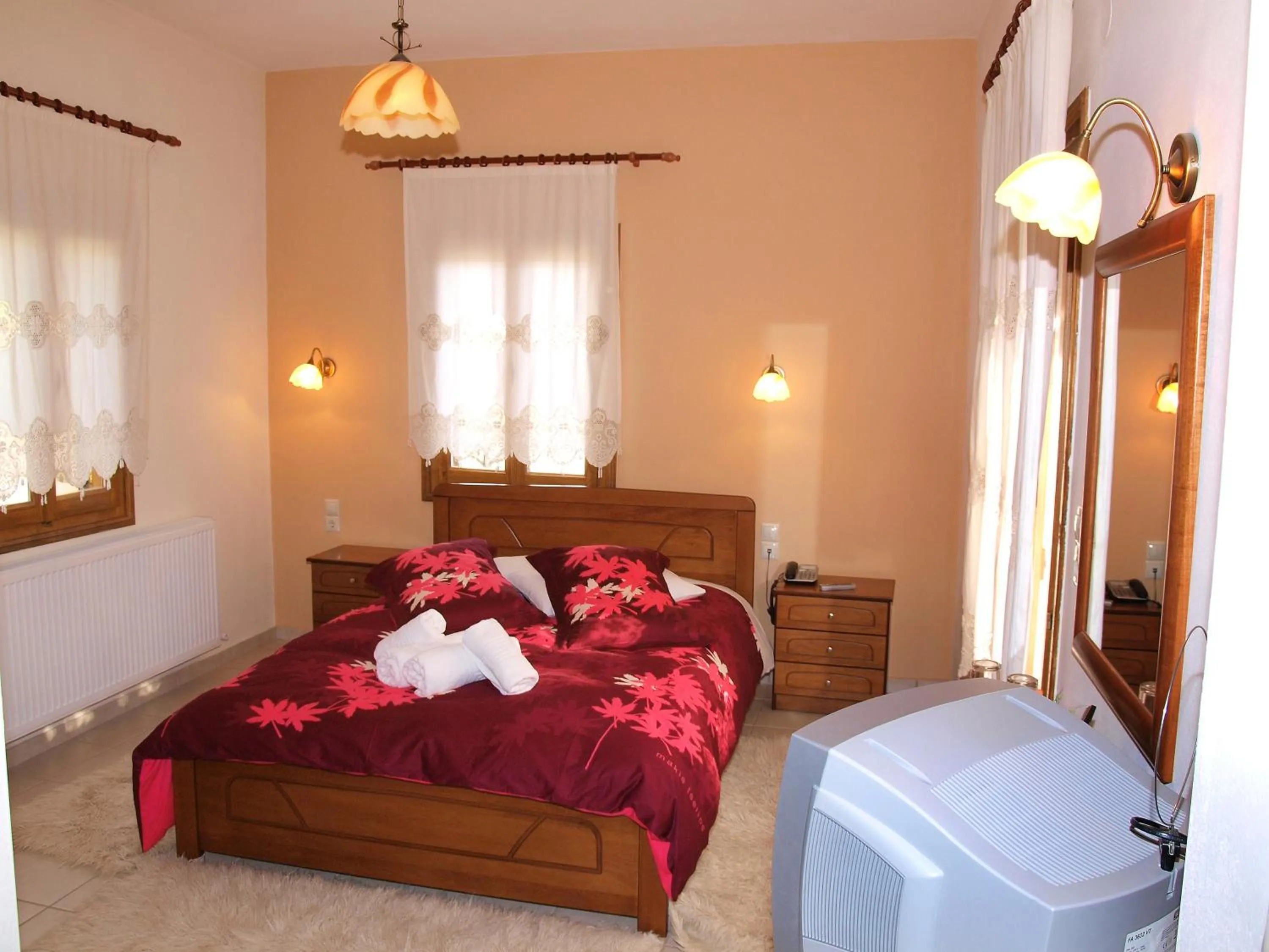 Bed in Hotel Ilianna