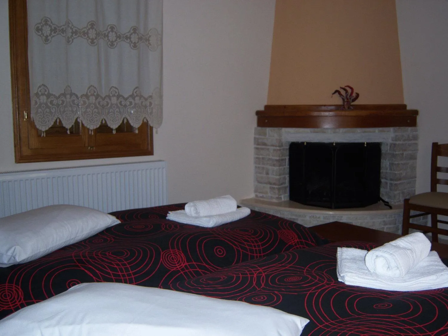 Bed in Hotel Ilianna