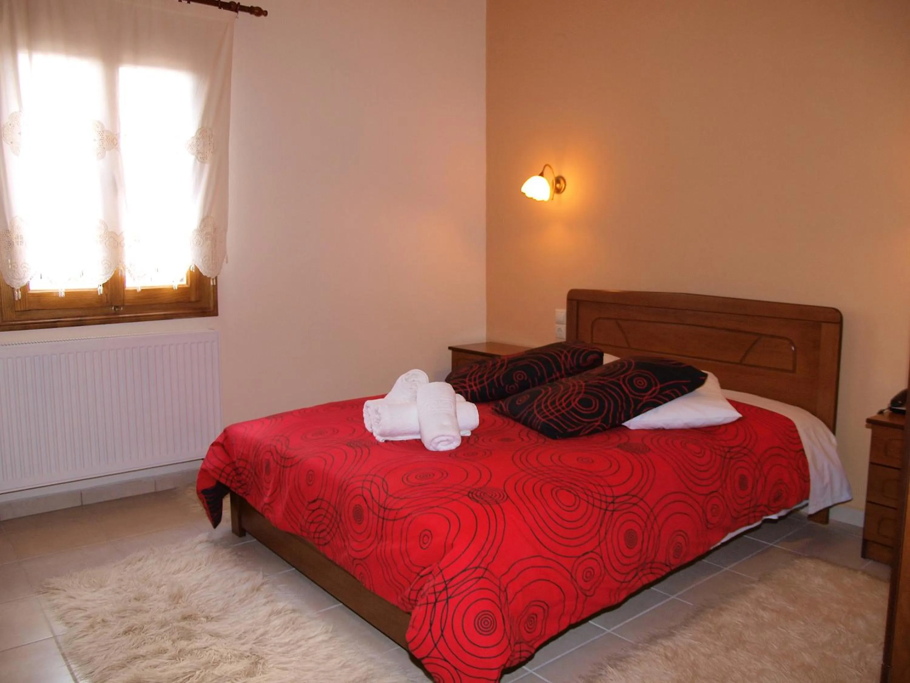 Bed in Hotel Ilianna