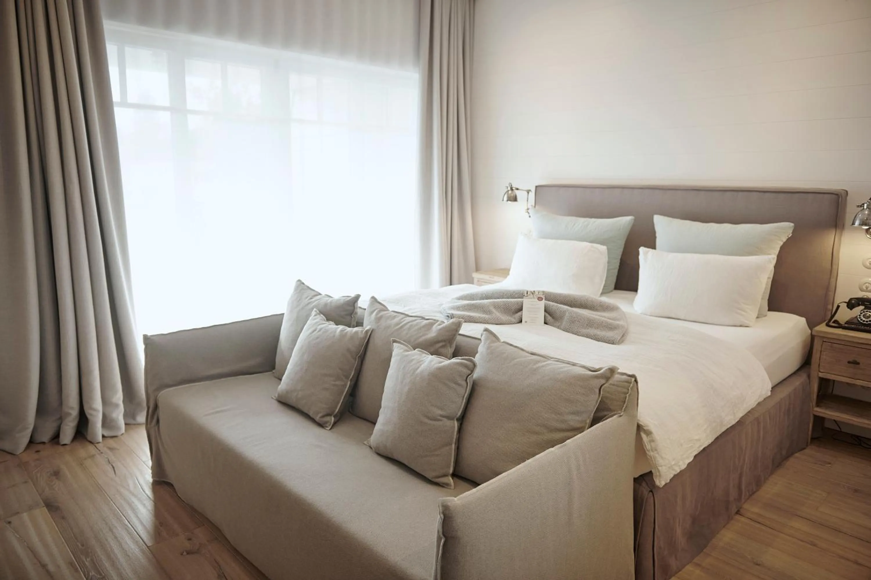 Bed in The Cozy Hotel & Lofts Timmendorfer Strand