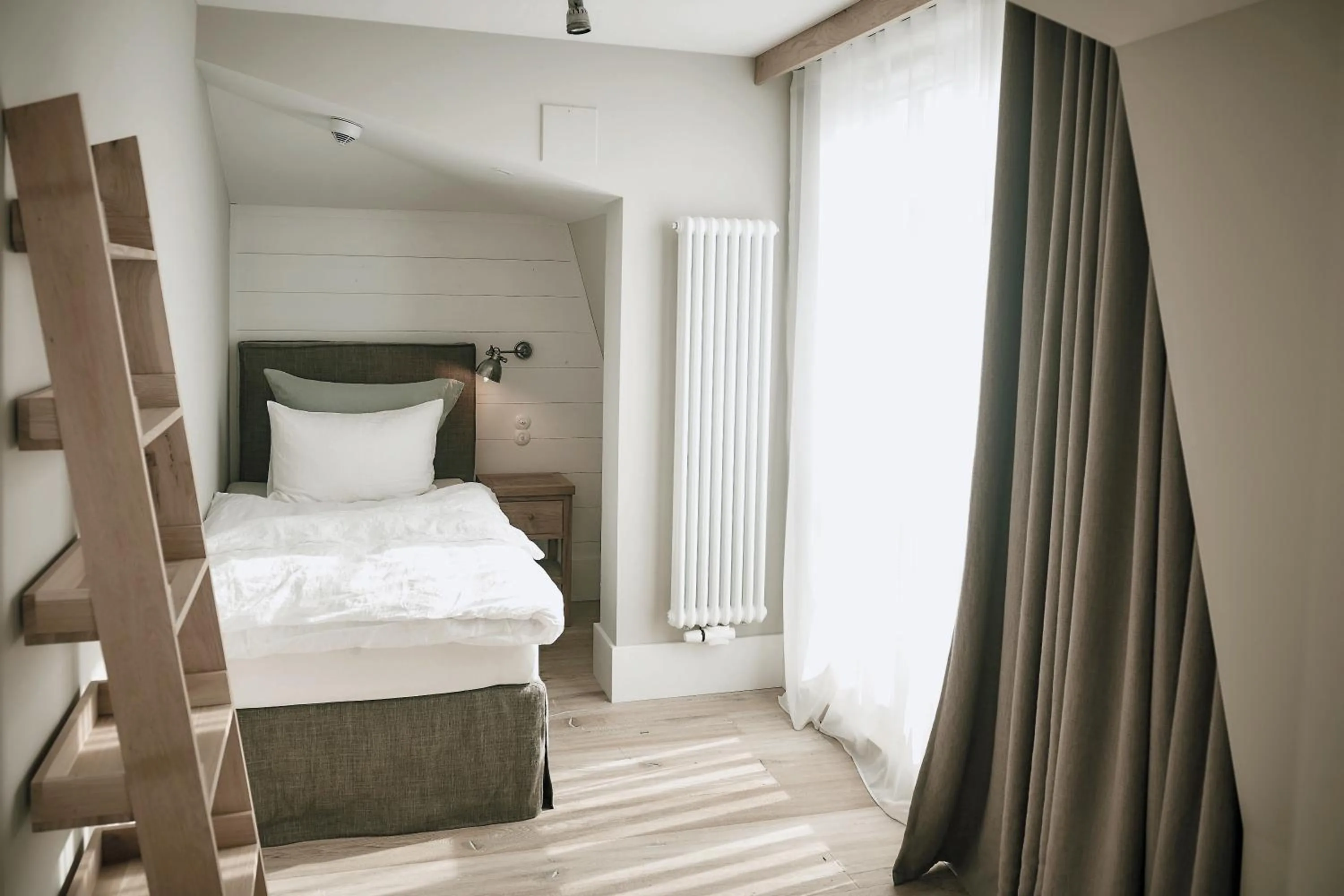 Bed in The Cozy Hotel & Lofts Timmendorfer Strand