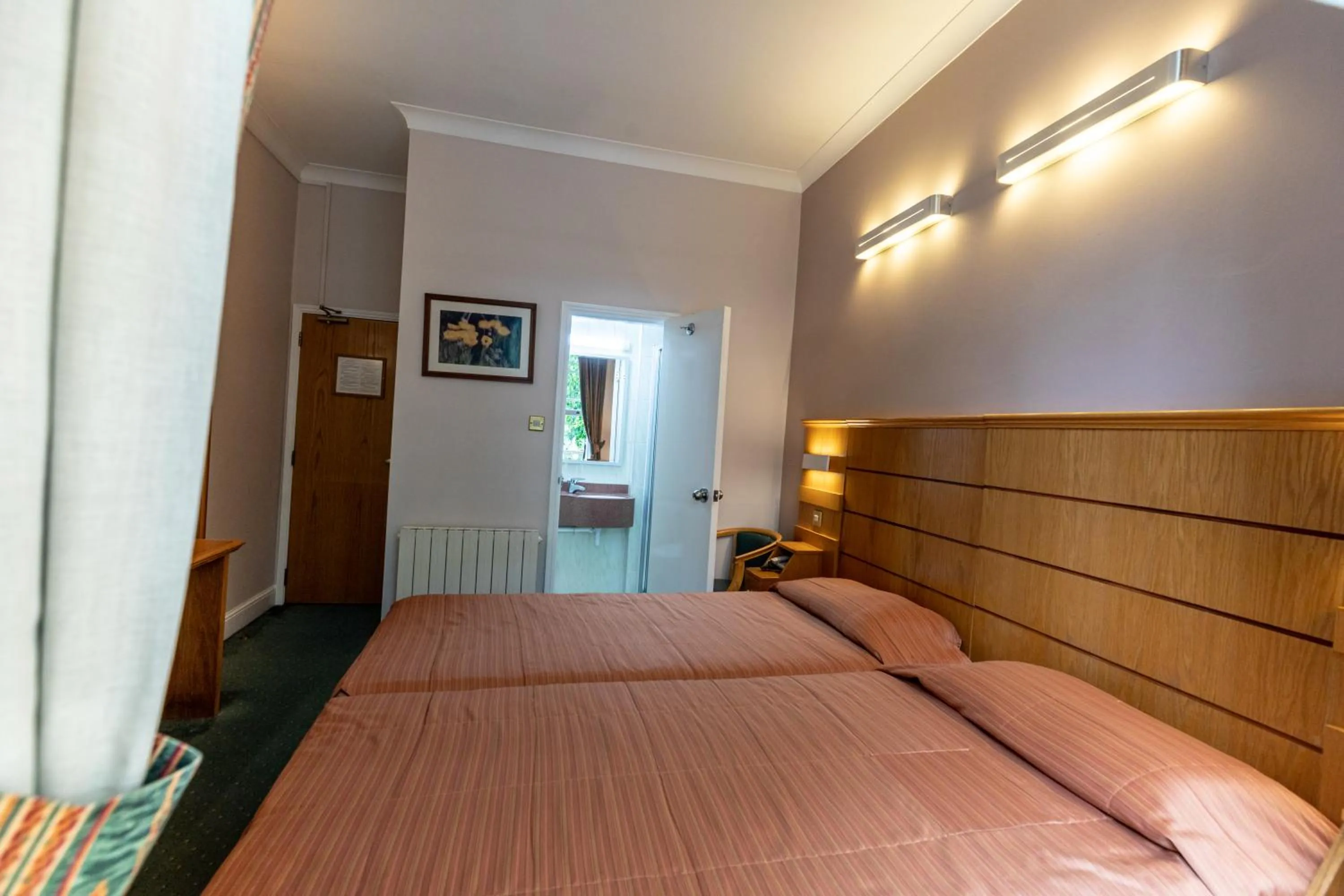 Bed in The Nayland Hotel