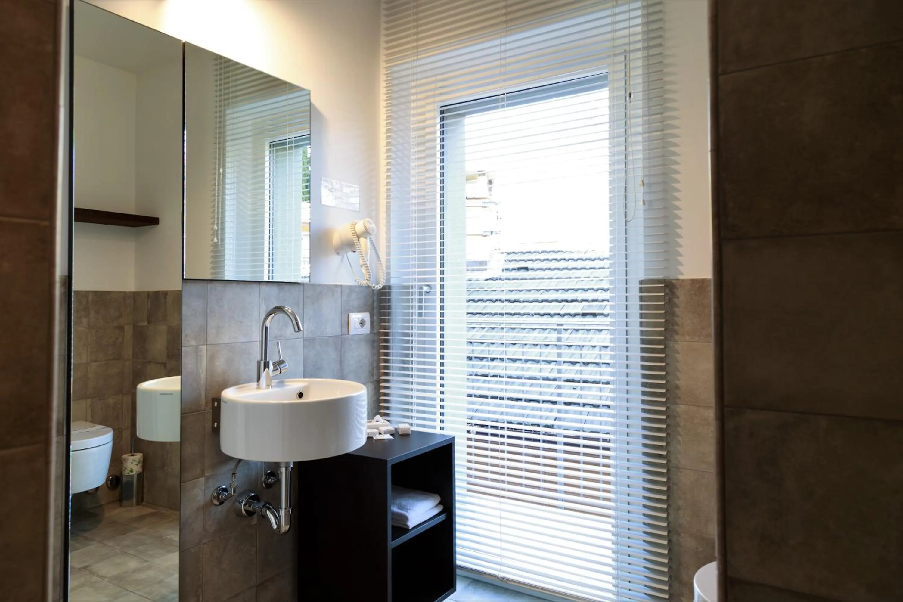 Bathroom in Nenè-Il Vicolo Apartments and Rooms